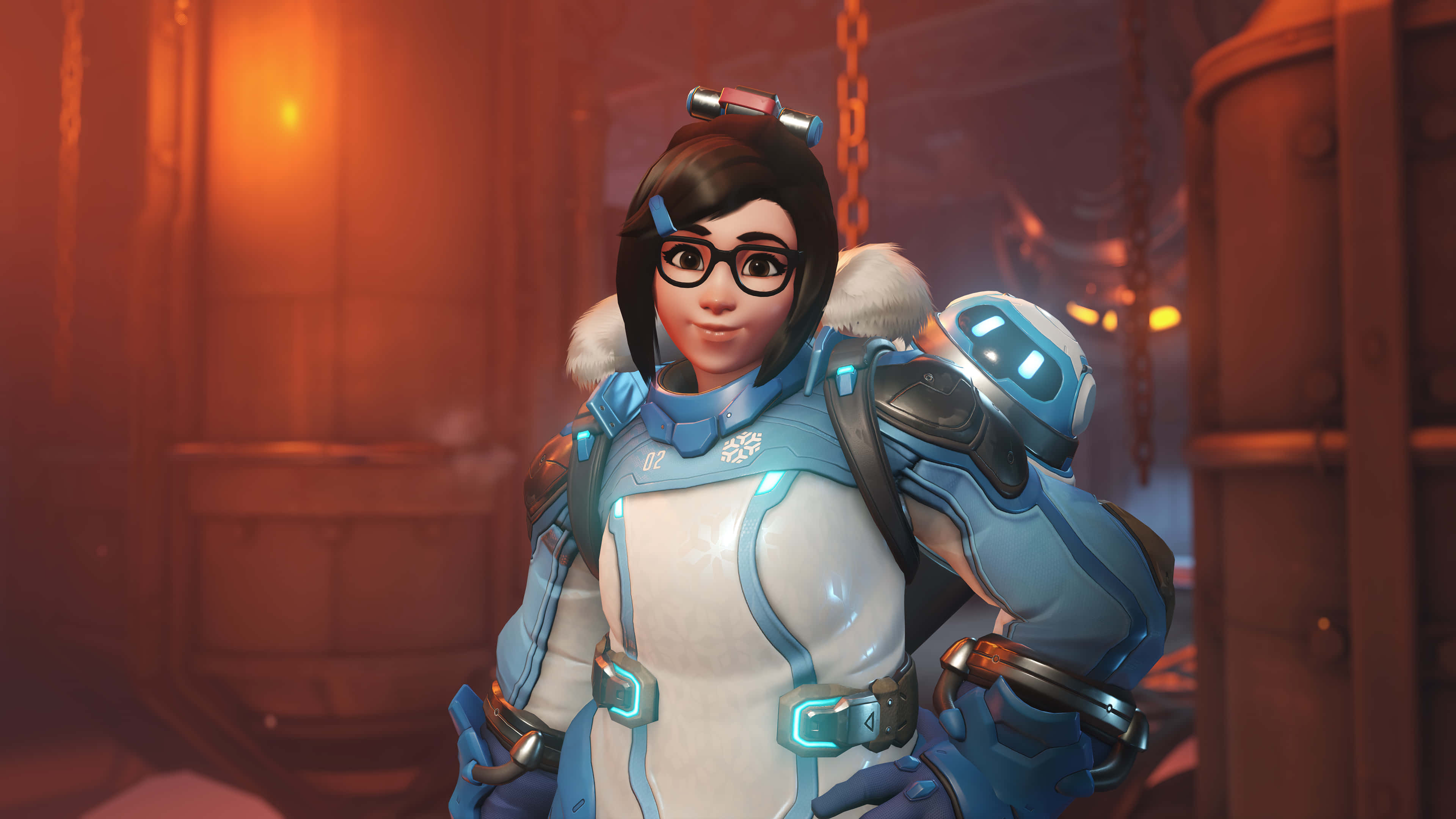Overwatch Heroes 桌布 壁紙 — 一位身穿藍白未來裝甲的女性英雄自信地站在溫暖照明的工業環境中。