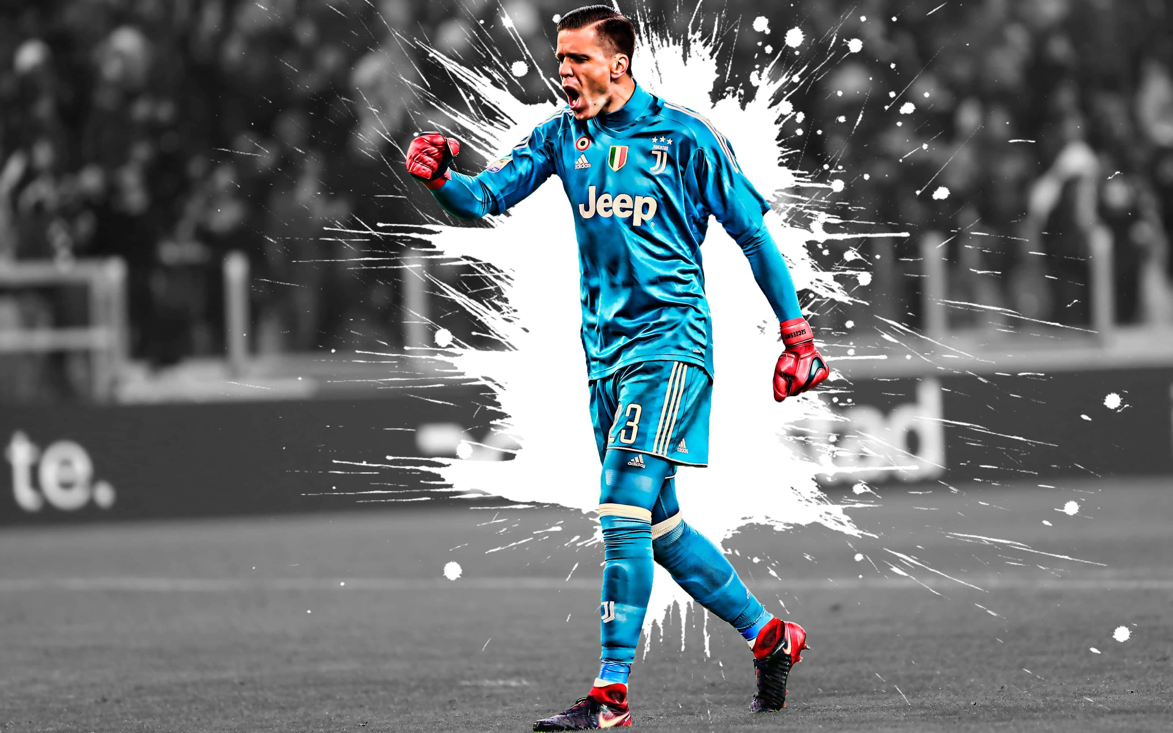 Wojciech Szczesny 桌布 壁紙 — 一位身穿藍色球衣的祖雲達斯門將在黑白球場上勝利咆哮，白色油漆飛濺在他周圍爆炸。