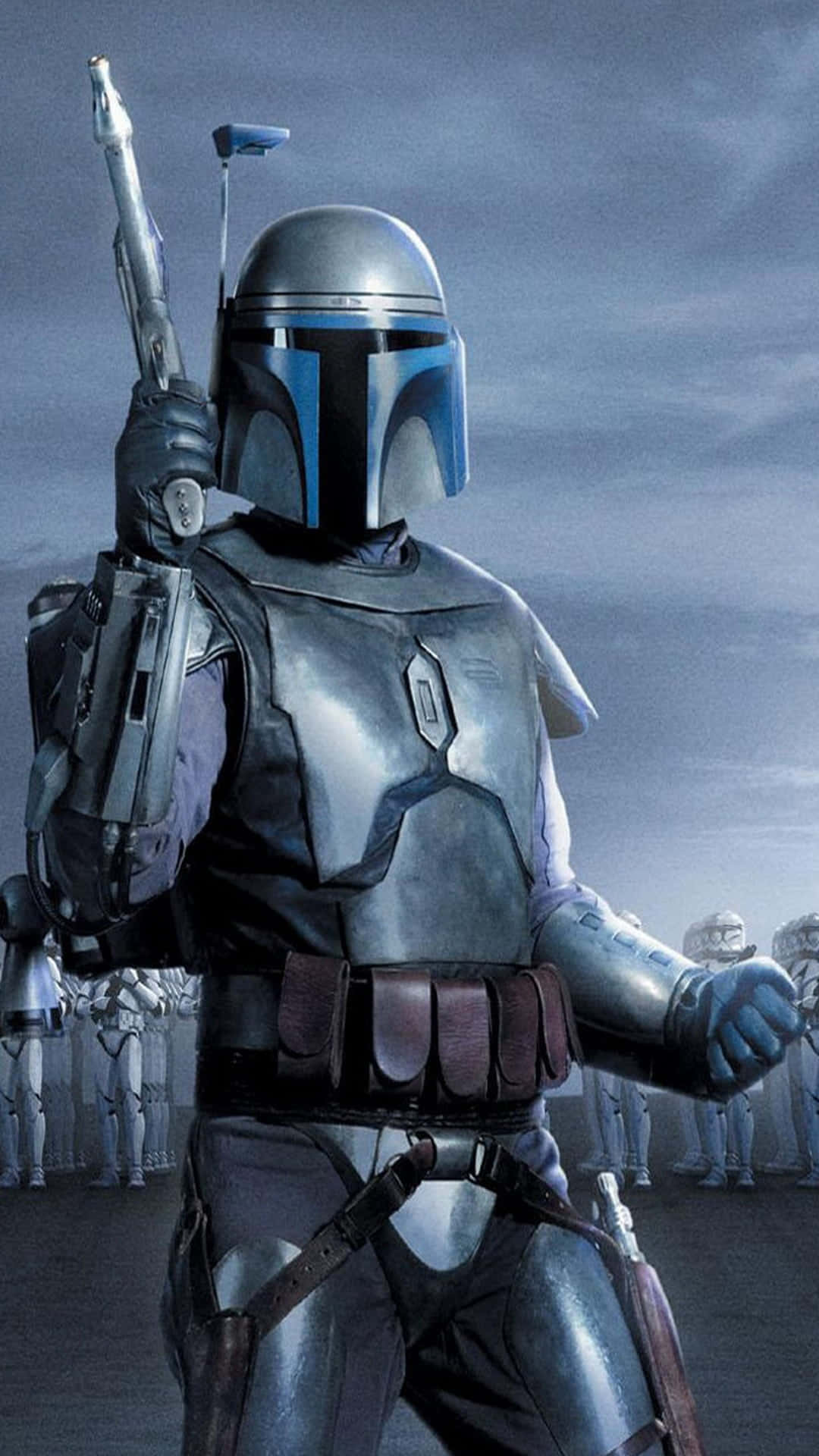 Bounty Hunters 桌布 壁紙 — 一位身穿銀色盔甲的曼達洛戰士，在陰暗的天空下手持爆能步槍，背景中有風暴兵。