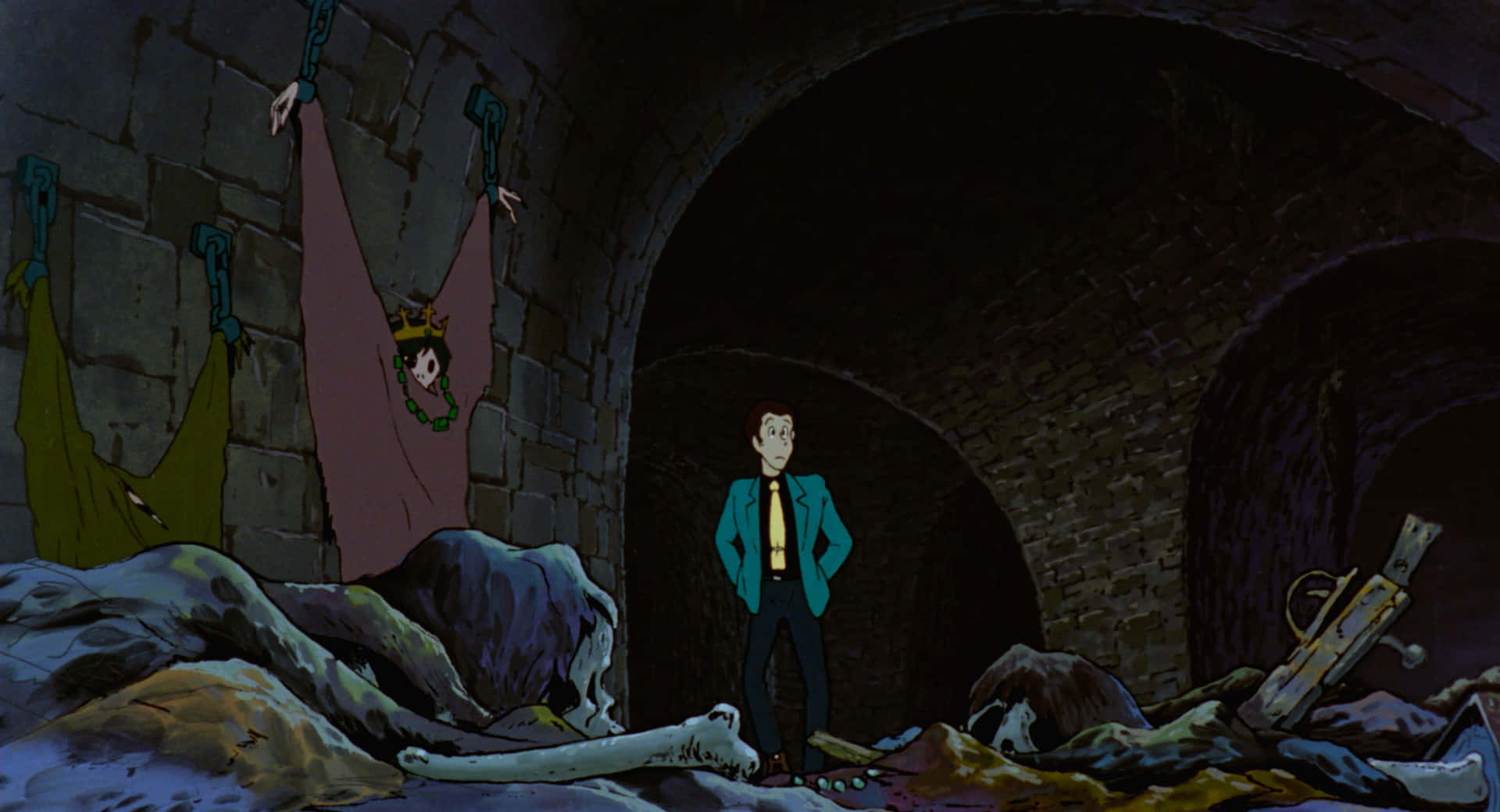 Lupin Iii The Castle Of Cagliostro 桌布 壁紙 — 一位身穿青綠色西裝的偵探站在昏暗的石頭地窖中，周圍掛滿屍體和散落的骨頭。