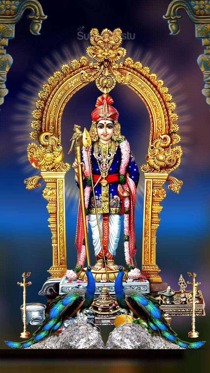 Hindu God 桌布 壁紙 — 一位閃耀的印度教神祇身著金色和藍色華服，端坐在發光拱門下的寶座上，兩側有孔雀立於鑲滿寶石的基座上。