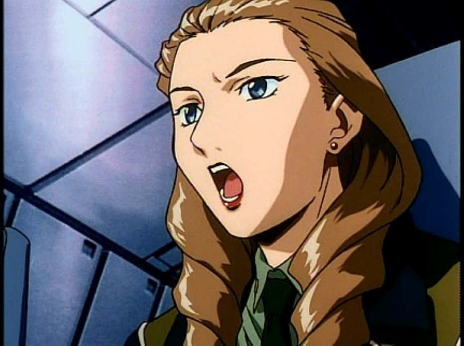 Gundam Wing Sally Po 桌布 壁紙 — 一位驚訝的動漫女性，金髮藍眼，在未來主義的駕駛艙中倒吸一口氣。