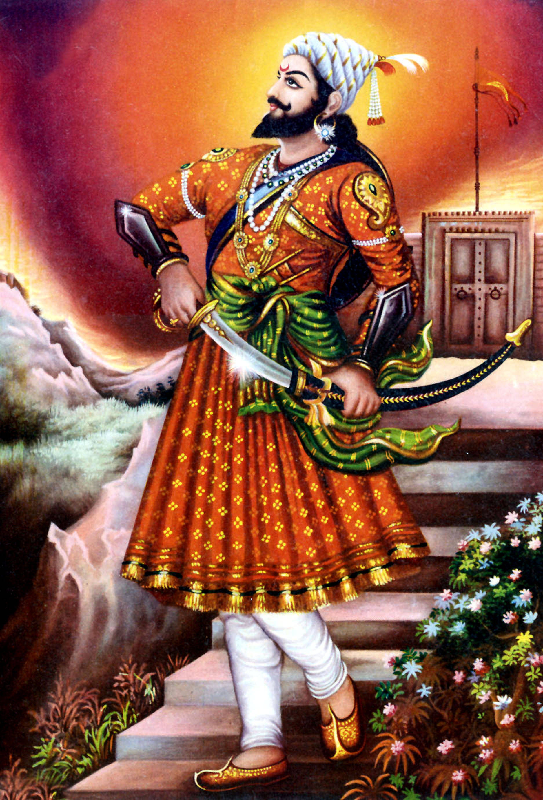 Indian 桌布 壁紙 — 一位高貴的印度戰士身穿華麗的橙色和綠色服裝，站在石階上，背景是熾熱的日落。