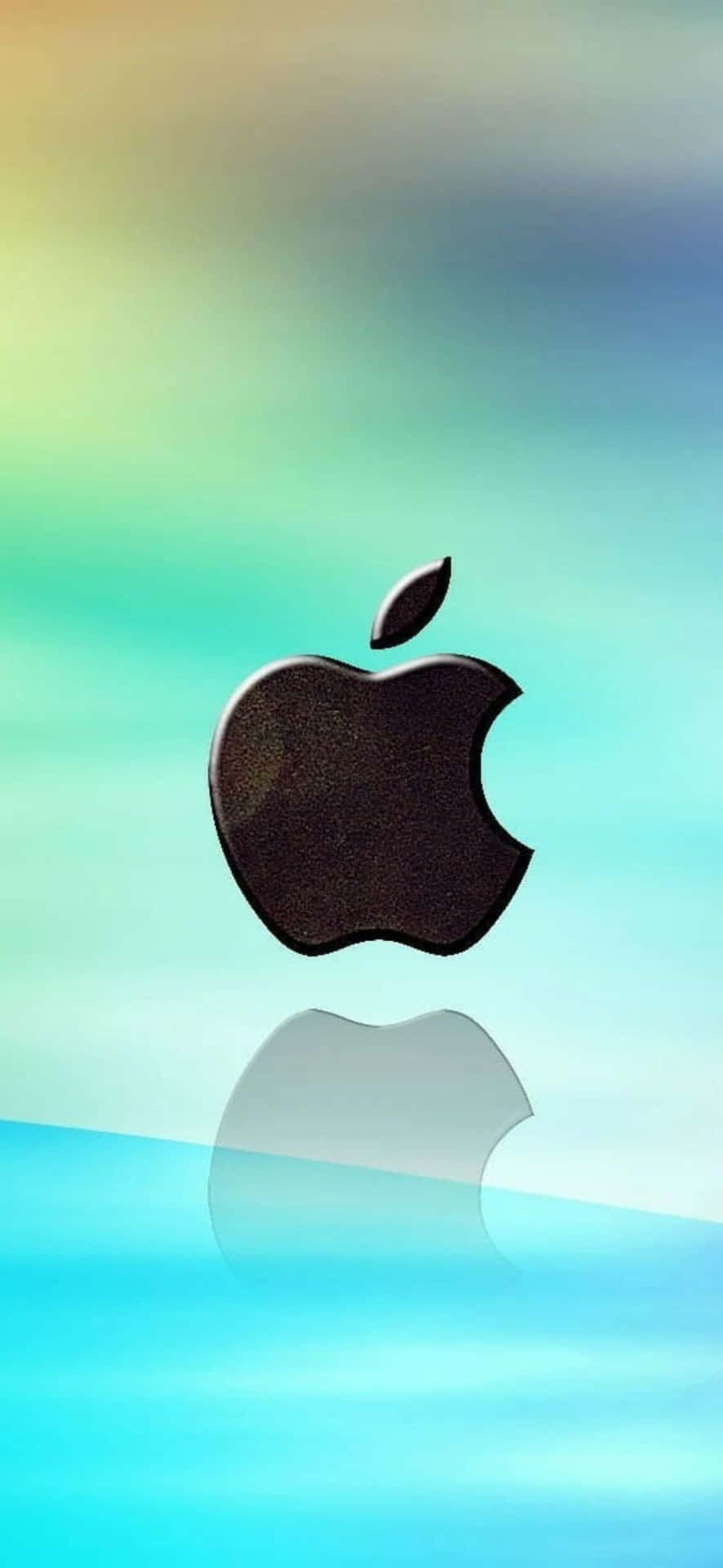 iPhone 14 Pro Max 桌布 壁紙 — 一個亮面黑色Apple標誌漂浮在反射面上方，背景是柔和漸變的青色、黃色和藍色天空。