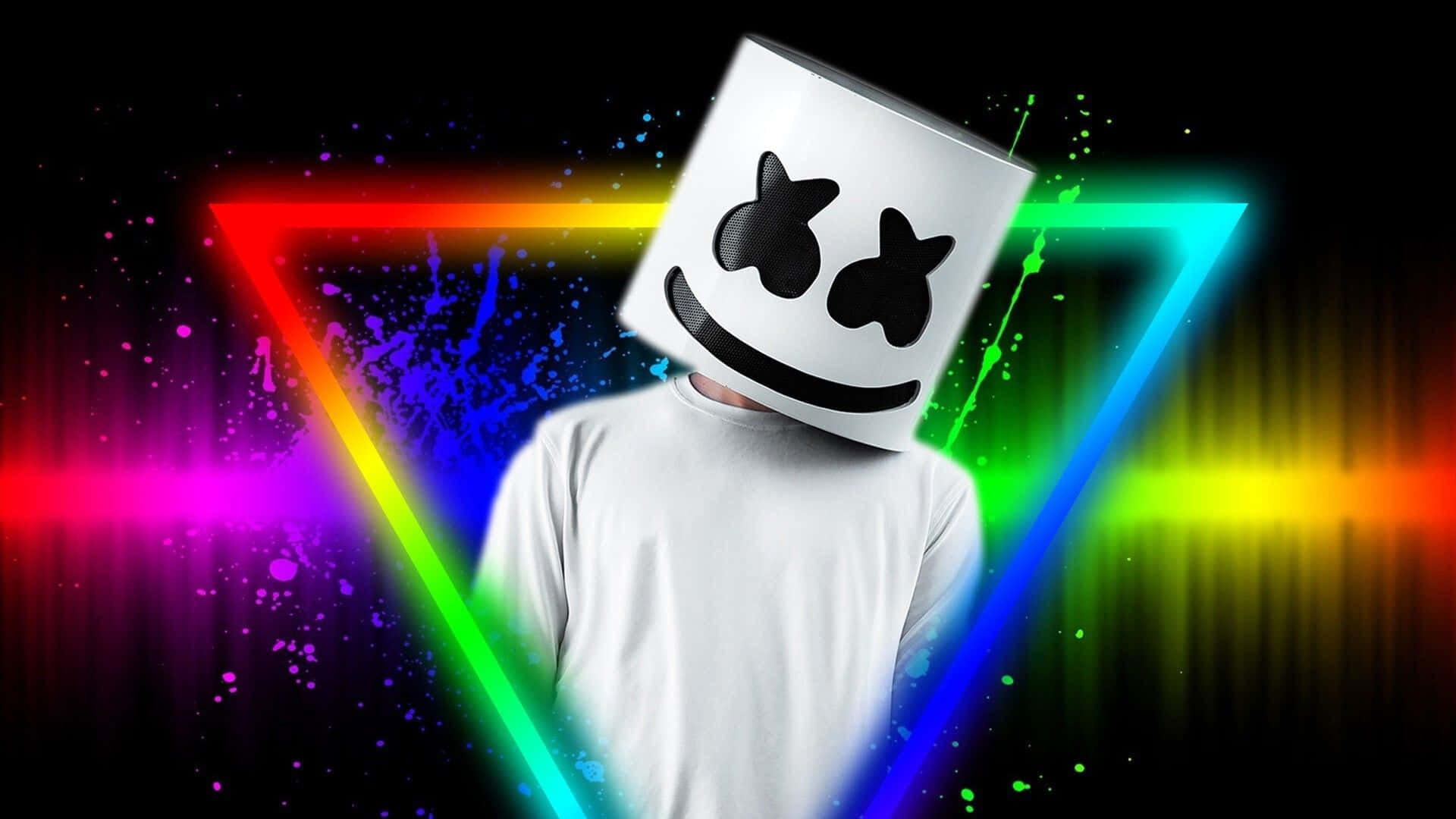 Marshmello 桌布 壁紙 — 一個人戴住白色棉花糖頭盔，企喺一個發光嘅彩虹三角形入面，背景係深色同埋有彩色油漆濺出嚟。