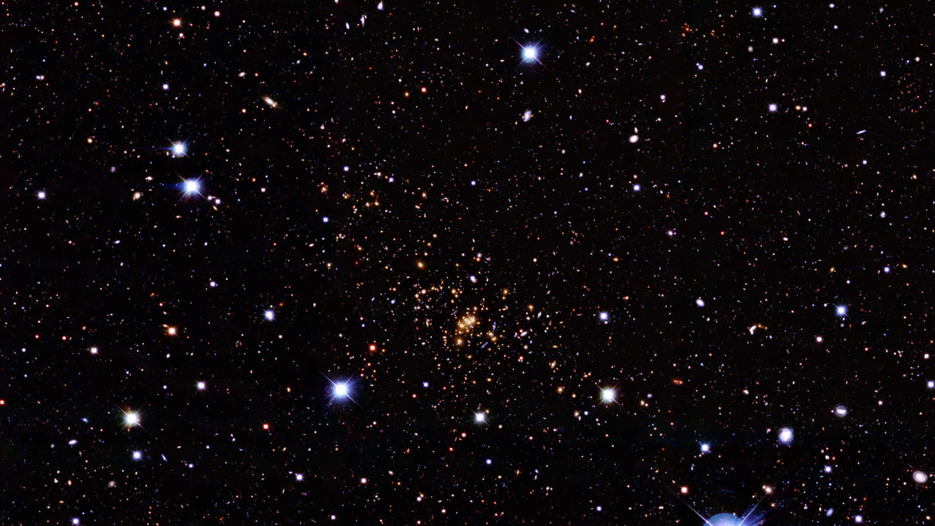 Beautiful Star 桌布 壁紙 — 一個令人嘆為觀止的密集星場景觀，明亮的藍色和橙色星星散落在深邃的黑色宇宙虛空中。