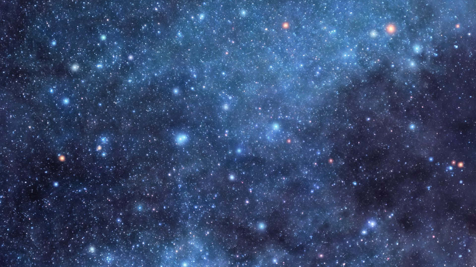 Cosmic Dust 桌布 壁紙 — 一個令人嘆為觀止的深藍色星空，充滿了無數閃爍的星星和發光的星雲。