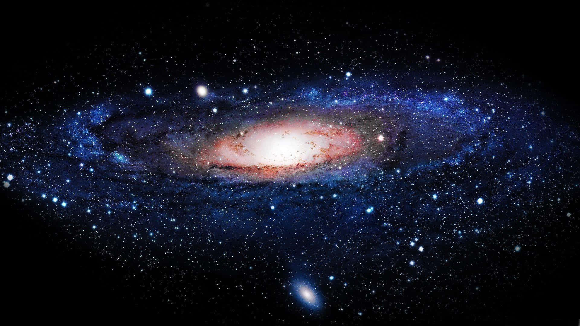 銀河系 桌布 壁紙 — 一個令人嘆為觀止的螺旋星系，在佈滿星辰的宇宙虛空中散發出藍色和紅色的光芒。