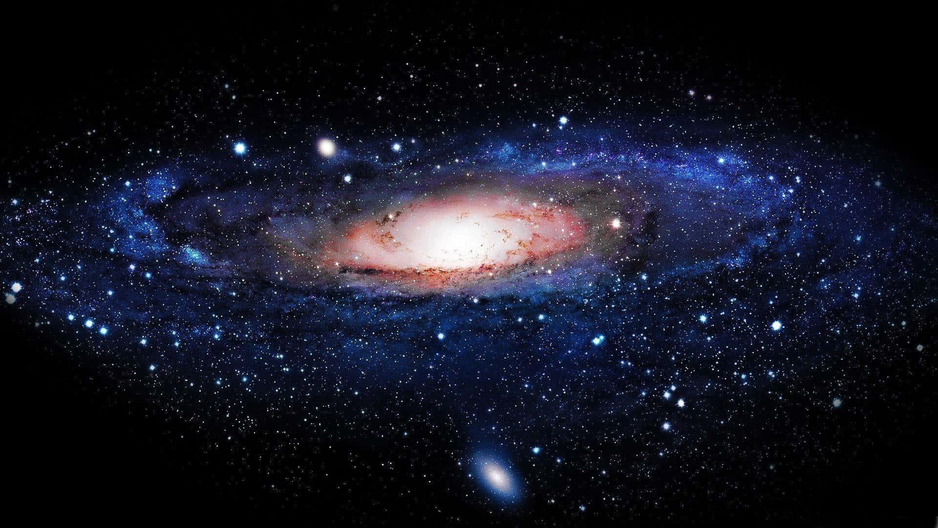 銀河系 桌布 壁紙 — 一個令人嘆為觀止的螺旋星系，在繁星點點的宇宙背景下閃耀著藍色和橙色的色調。