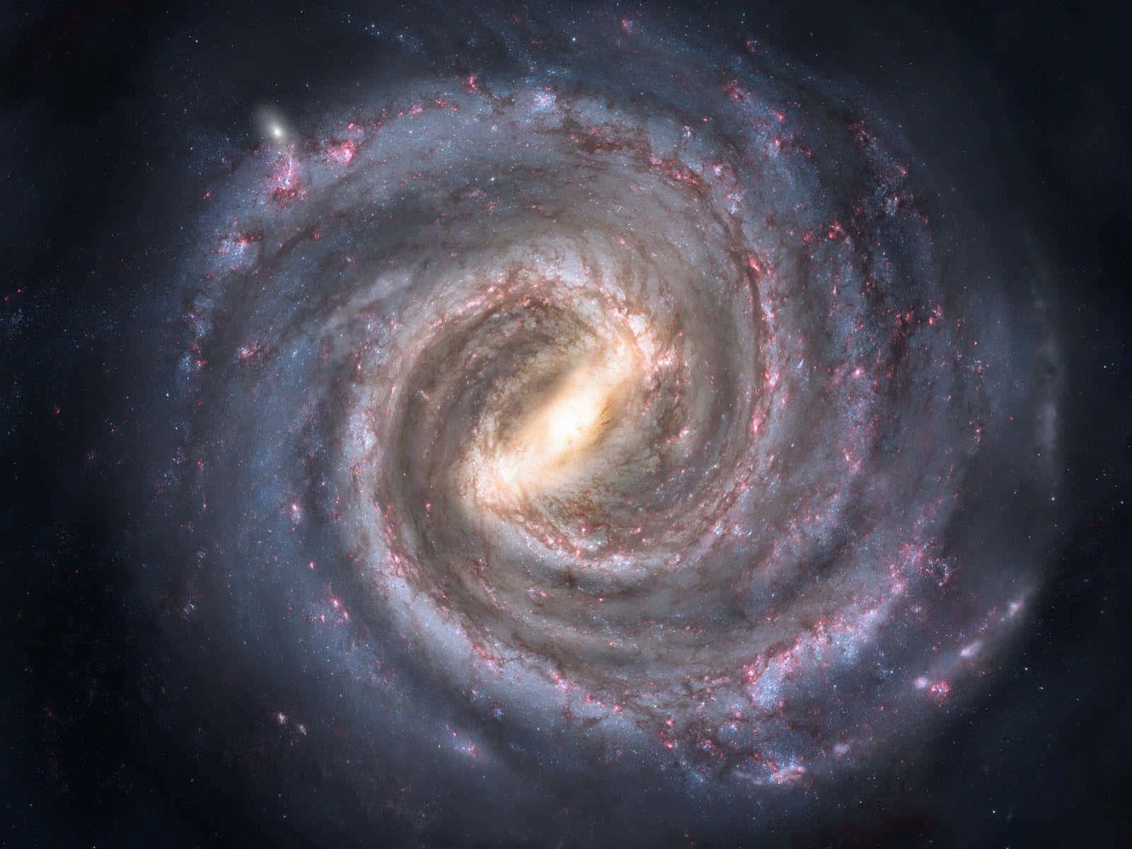 銀河系 桌布 壁紙 — 一個令人嘆為觀止的螺旋星系，在繁星點點的宇宙虛空中旋轉，散發著粉紅色和藍色的星雲光芒。