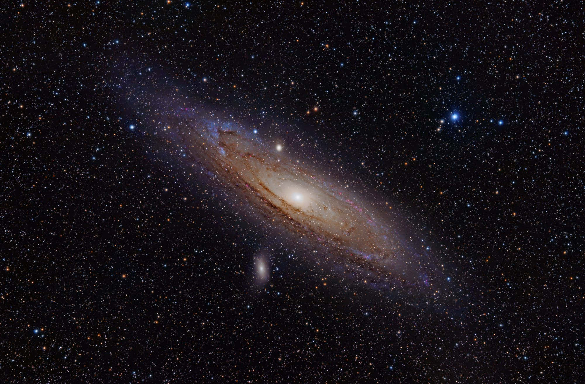 Whirlpool Galaxy 桌布 壁紙 — 一個令人驚嘆的螺旋星系，擁有發光的旋臂和無數恆星，背景是深邃的黑色宇宙。