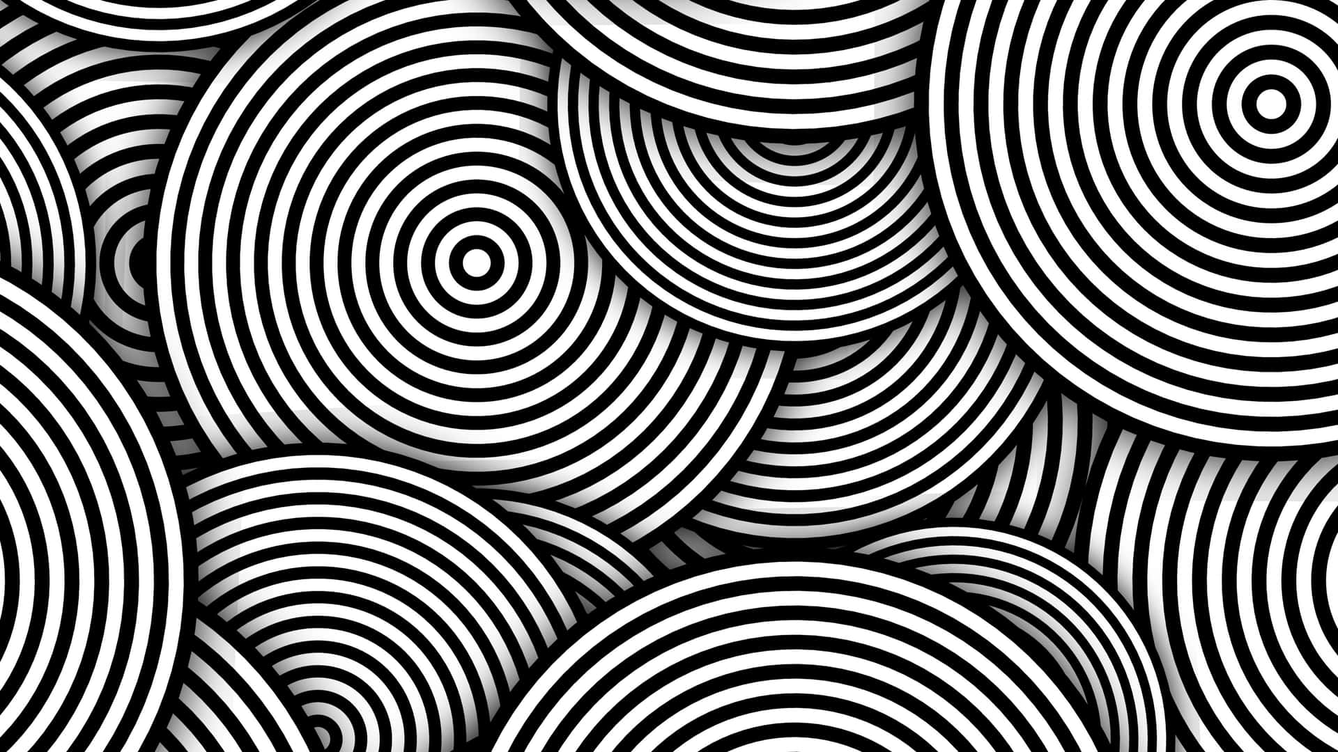 Minimalist Black And White 桌布 壁紙 — 一個催眠般的黑白牆紙，重疊的同心圓創造出動態的視錯覺。