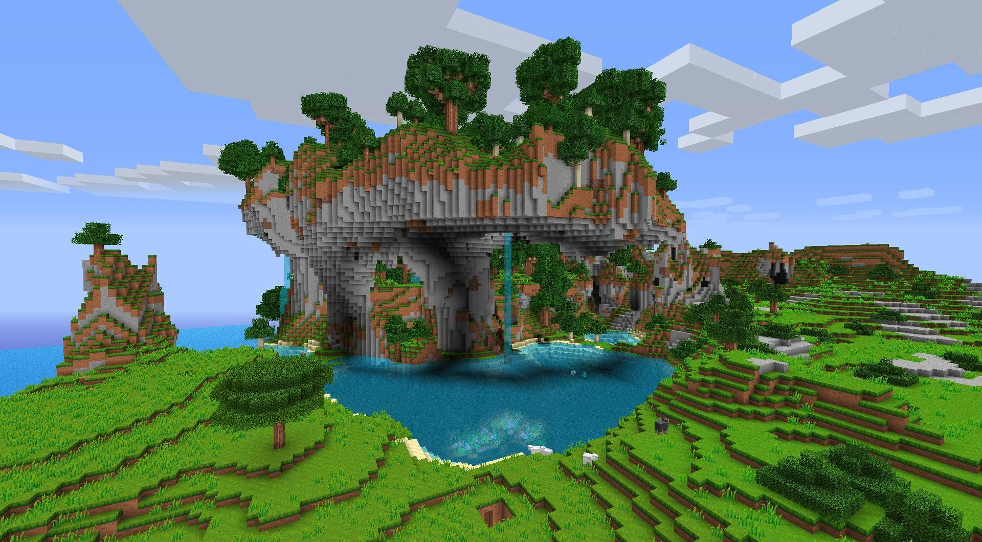 藍天 桌布 壁紙 — 一個像素化的Minecraft景觀， featuring 一座高聳的懸崖，瀑布傾瀉而下，流入一個被綠色草丘和樹木環繞的藍色水池，天空多雲。