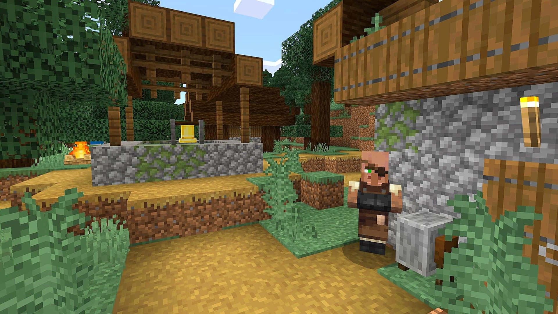 Minecraft Villager 桌布 壁紙 — 一個像素化的Minecraft村民站在石牆和木結構附近，身處一個綠意盎然的村莊，天空清澈湛藍。