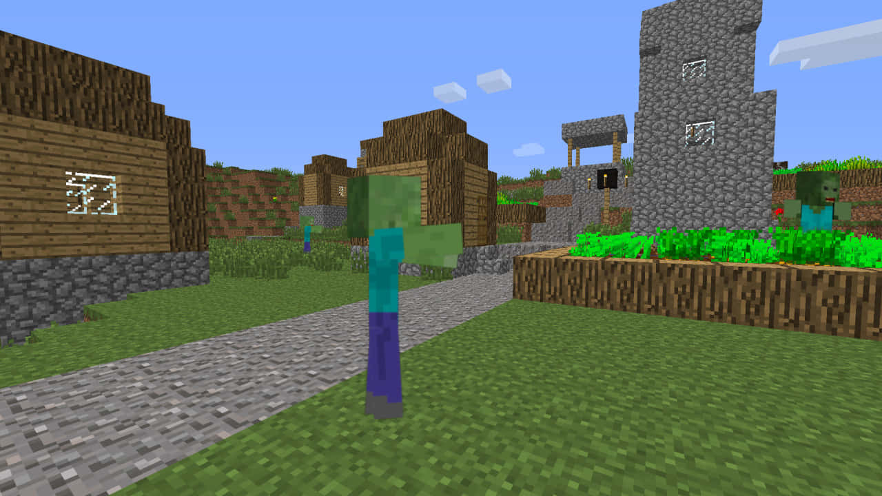 Minecraft Zombie 桌布 壁紙 — 一個像素化的喪屍站在 Minecraft 村莊的鵝卵石小徑上，村莊有木屋和石塔，天空清澈湛藍。