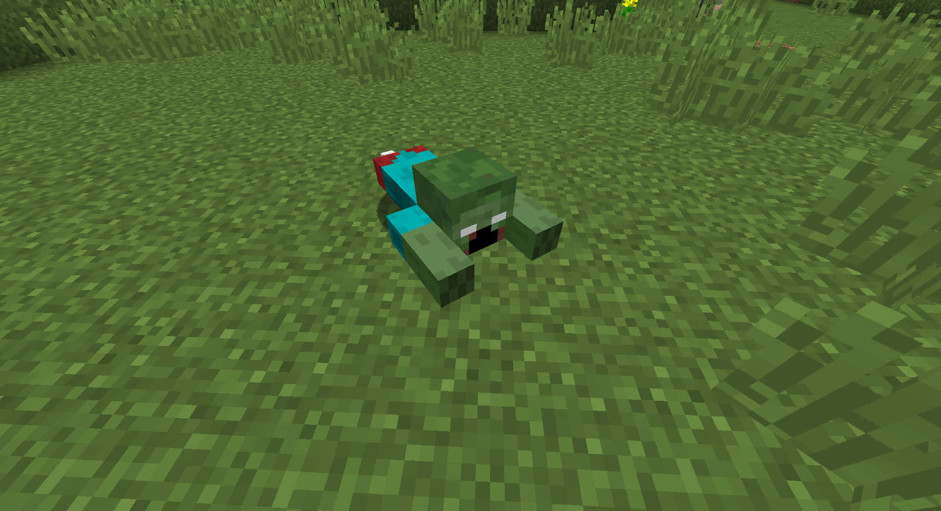 Minecraft Zombie 桌布 壁紙 — 一個像素化的喪屍趴喺一個方塊Minecraft世界嘅草地上面，喺日光之下。