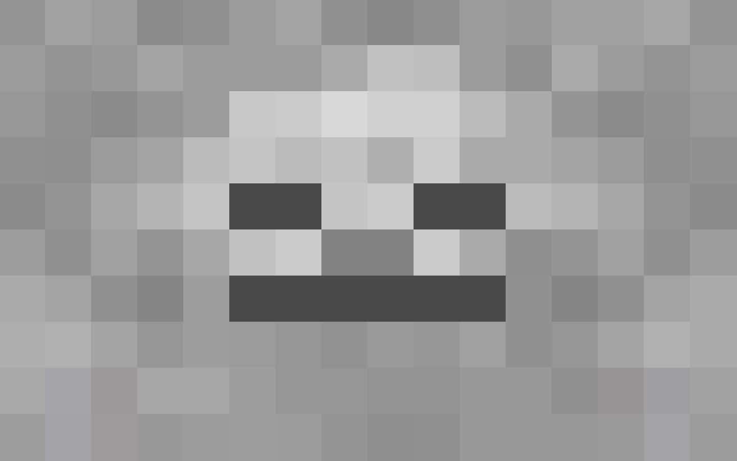 Minecraft Skeleton 桌布 壁紙 — 一個像素化的灰色頭骨，帶有黑色眼窩和嘴巴，背景為斑駁的灰色。