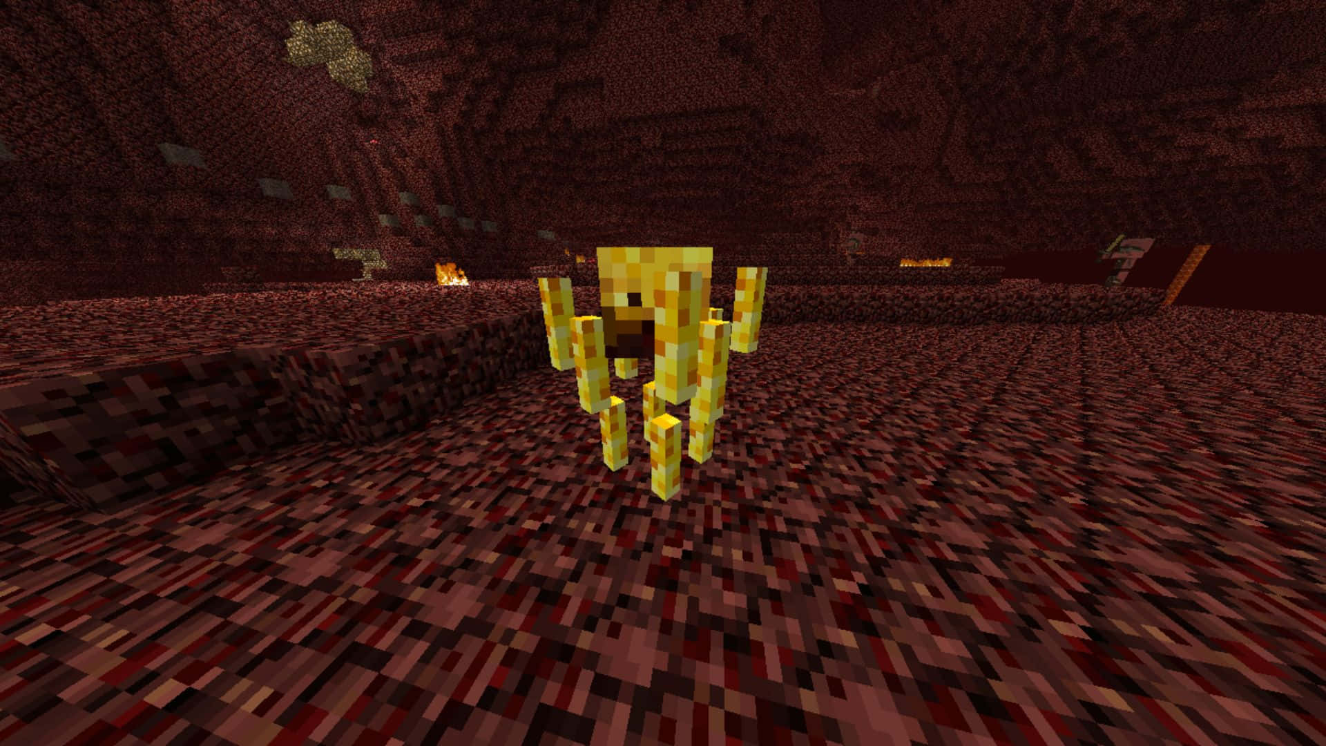 Minecraft Blaze 桌布 壁紙 — 一個像素化的金色魔像站在一個熾熱的地獄洞穴中，周圍有紅色地獄岩和遠處的熔岩流。