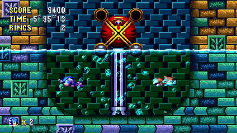 Sonic Hydrocity Zone 桌布 壁紙 — 一個像素化遊戲場景顯示索尼克喺水底，靠近中央管道，上面有一個紅色大佬敵人。