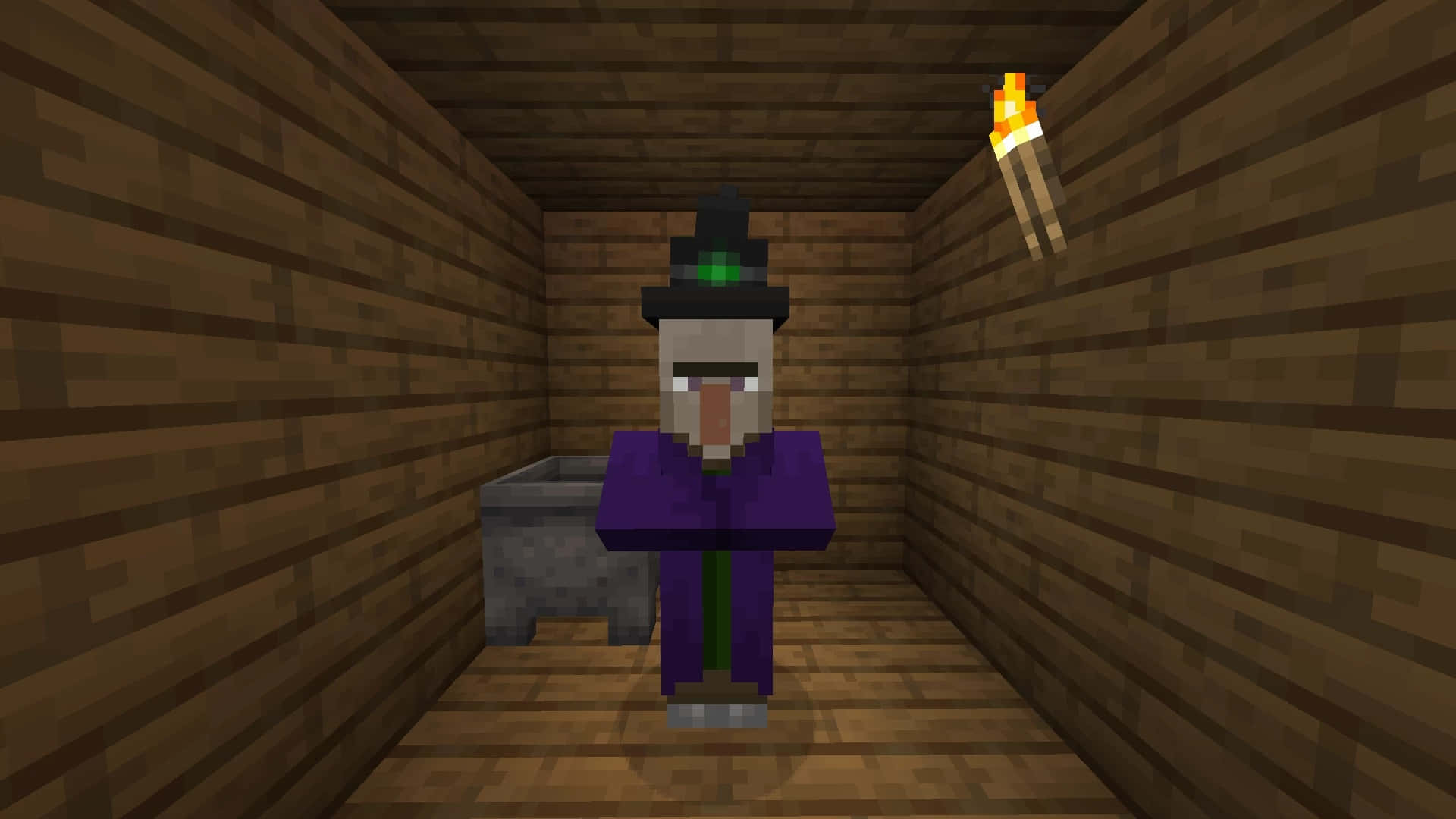 Minecraft Witch 桌布 壁紙 — 一個像素風格的巫婆，身穿紫色長袍和黑色帽子，站在木屋內手持火炬。
