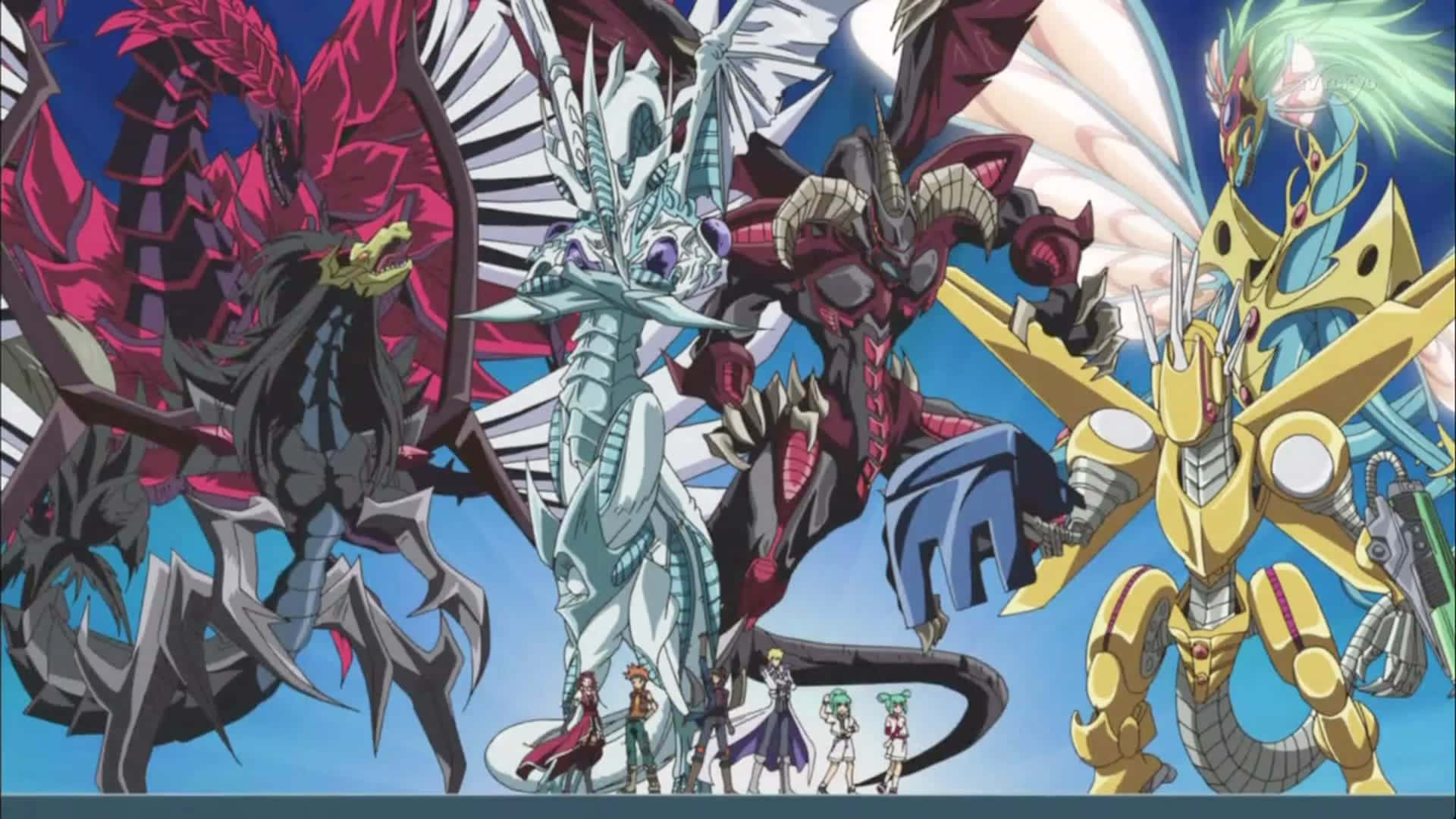Yugioh Dragons 桌布 壁紙 — 一個充滿活力的動漫場景，五個巨大、設計複雜的怪物生物聳立在一群細小的人形角色之上，背景是清澈的藍天。
