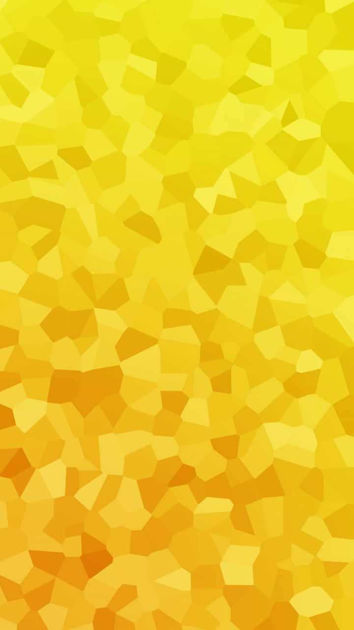 Yellow Geometric 桌布 壁紙 — 一個充滿活力的抽象圖案，由不規則的多邊形形狀組成，採用溫暖的黃色和橙色色調。
