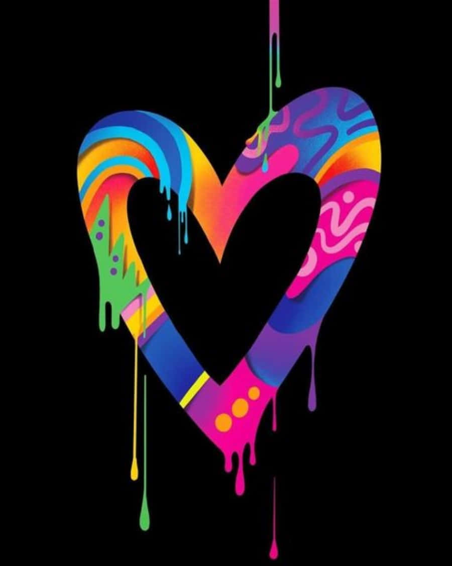 Heart Art 桌布 壁紙 — 一個充滿活力的滴心，帶有彩虹漩渦和霓虹顏料滴落在黑色背景上。