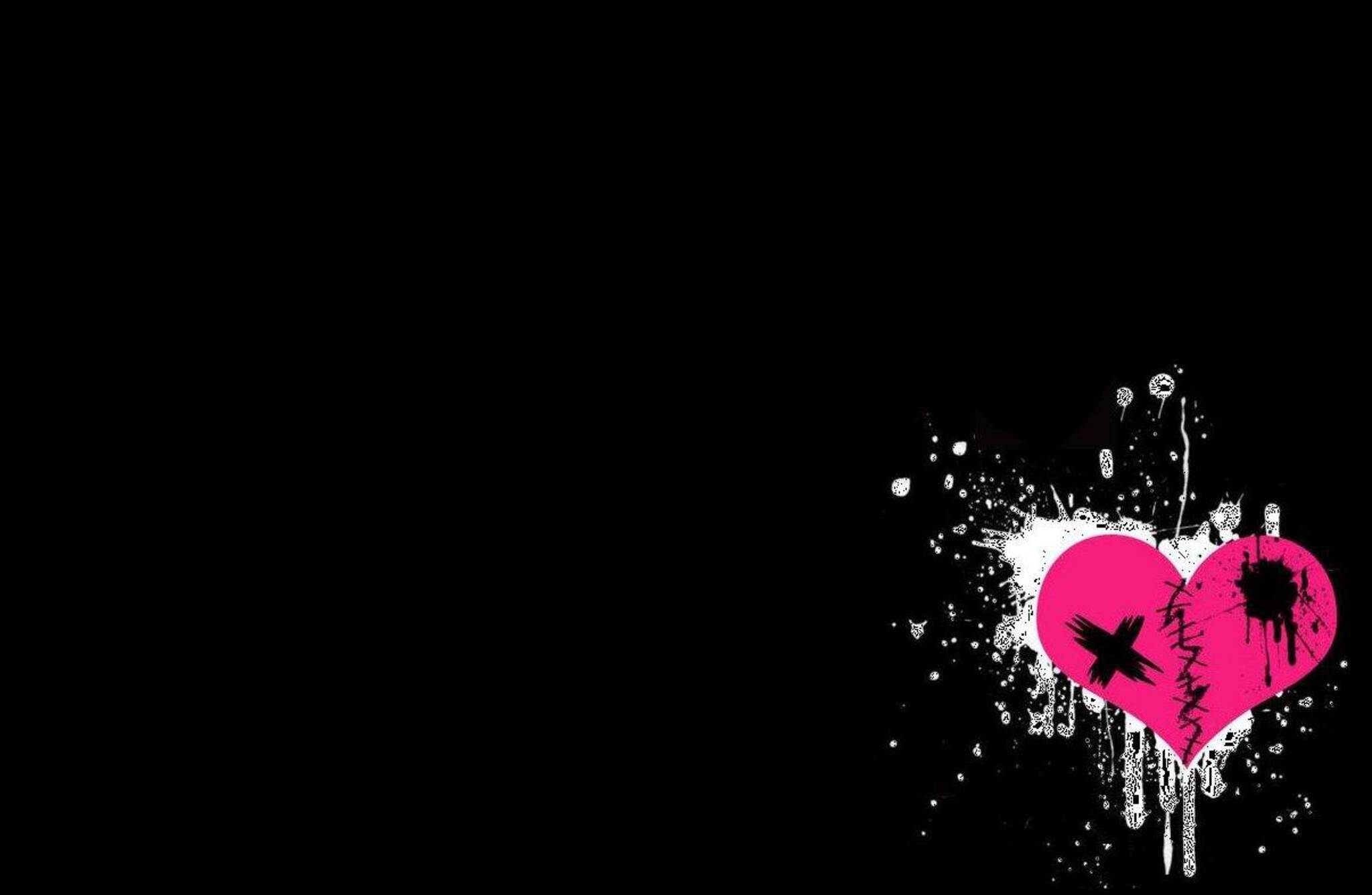 Reach out and feel the true emotion of love. 壁紙 — 一個充滿活力的粉紅色心形，帶有黑色塗鴉和白色飛濺，在純黑色背景上爆裂開來。