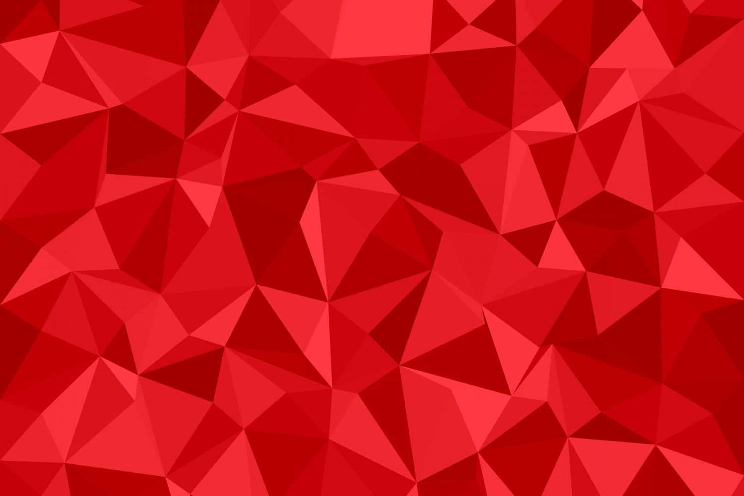 Mosaic 桌布 壁紙 — 一個充滿活力的紅色抽象背景，由不規則的多邊形面組成，帶有各種深淺色調，營造出動態的幾何紋理。