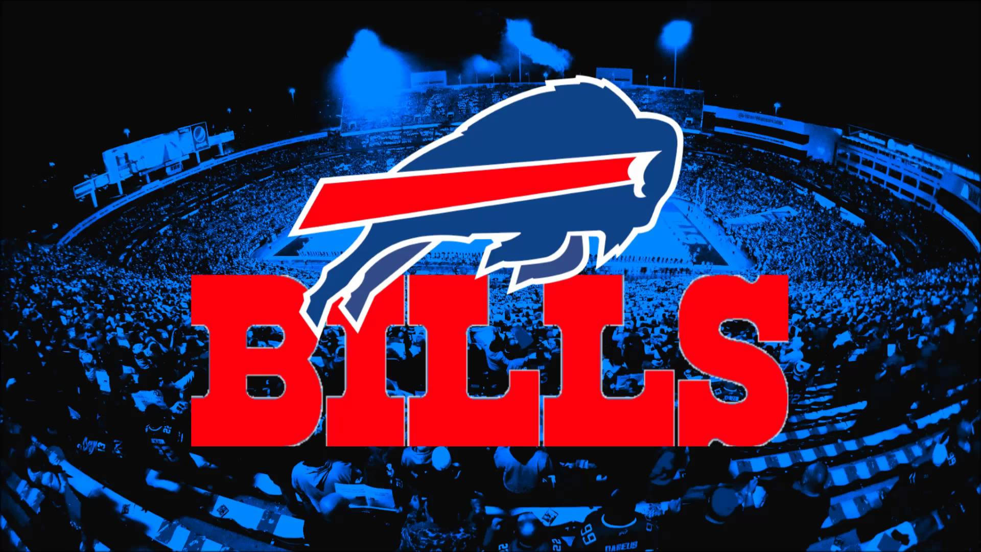 Bills 桌布 壁紙 — 一個充滿活力的藍色體育場，在明亮的燈光下擠滿了球迷，大膽的紅色比爾隊標誌和球隊名稱佔據了前景。