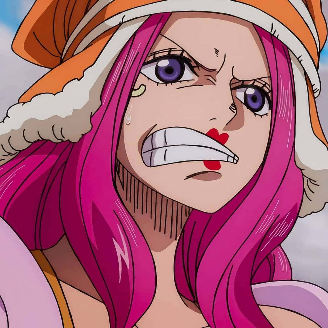Jewelry Bonney 桌布 壁紙 — 一個兇猛嘅動漫女仔，粉紅色頭髮同紫色眼睛，咬緊牙關發嬲，戴住橙色帽。