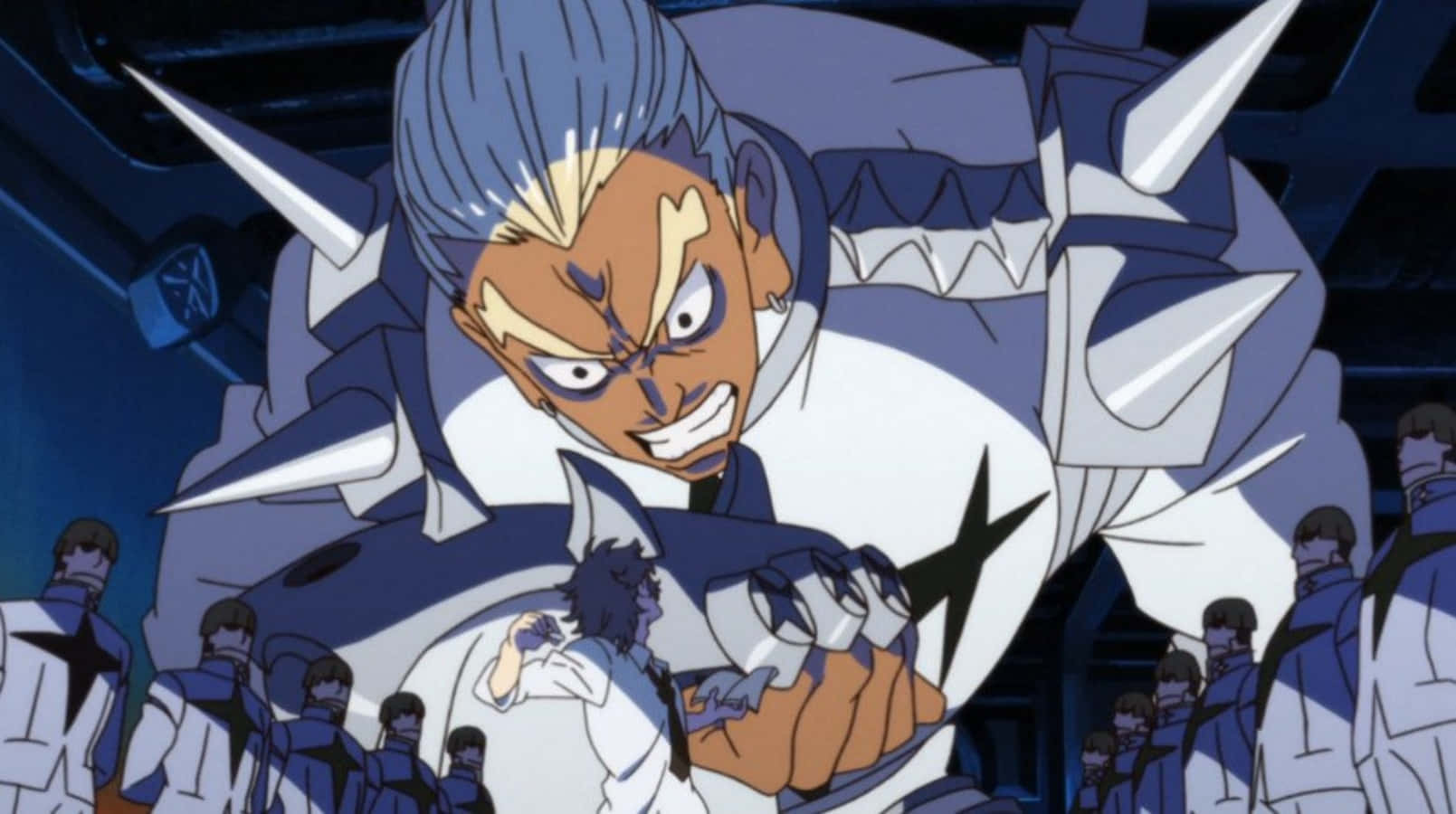 Ira Gamagoori 桌布 壁紙 — 一個動漫角色，擁有尖刺的藍色頭髮和兇猛的表情，穿著帶有黑色星星標誌的白色和藍色裝甲服。