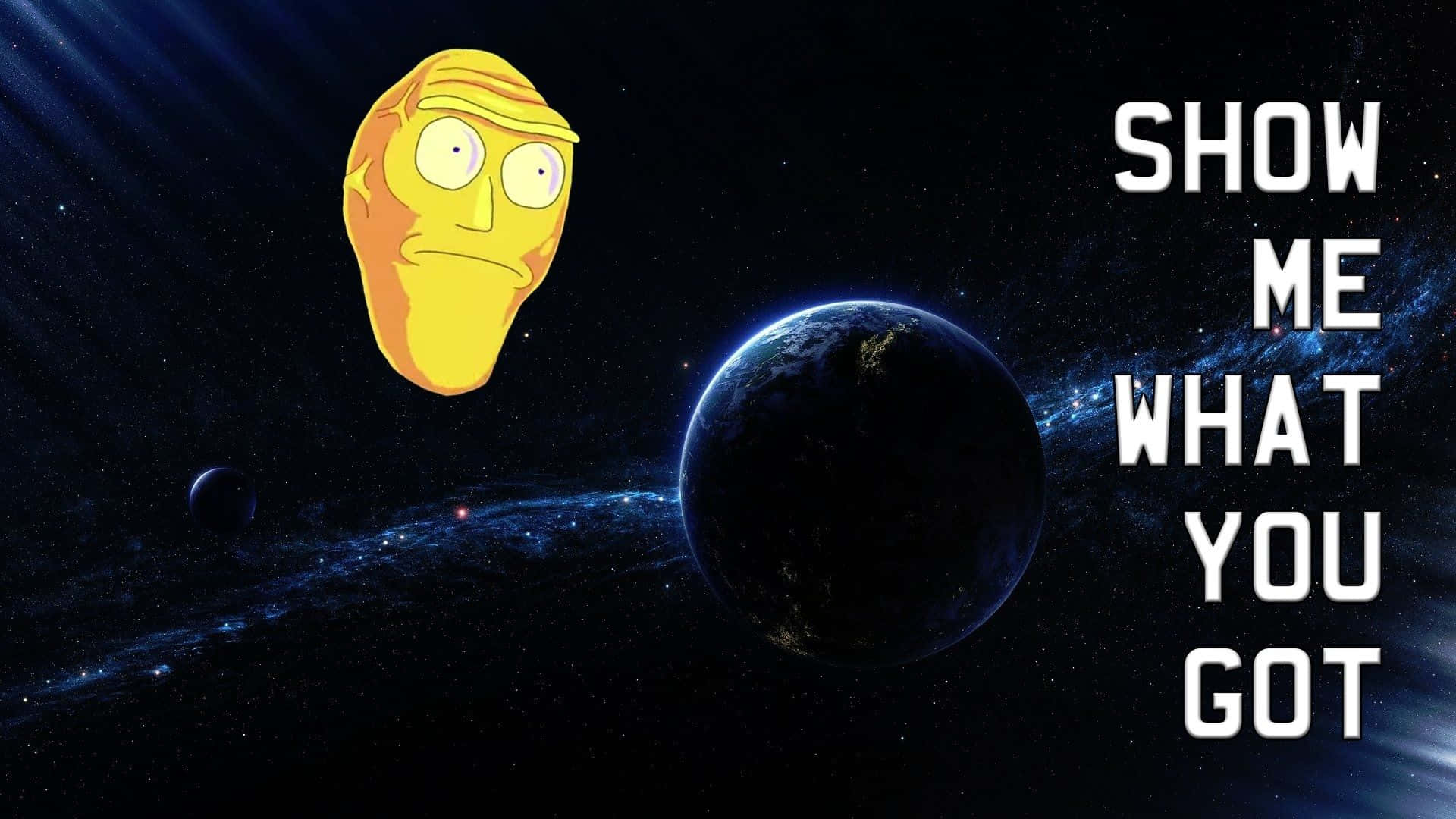 Giant Heads 桌布 壁紙 — 一個卡通黃色面孔漂浮在太空，旁邊有一個行星，上面有發光文字寫著 show me what you got。