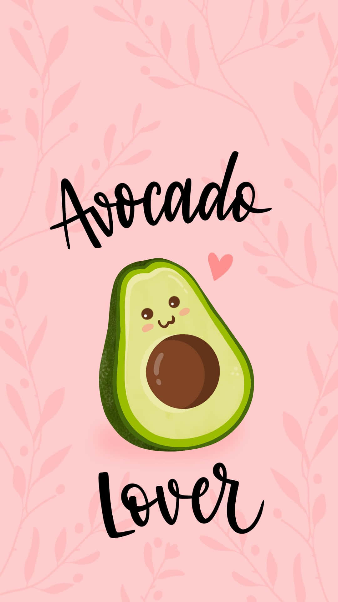 Avocado 桌布 壁紙 — 一個可愛的卡通牛油果，面帶微笑，坐在柔軟的粉紅色背景中央，背景有葉子圖案和「avocado lover」字樣。