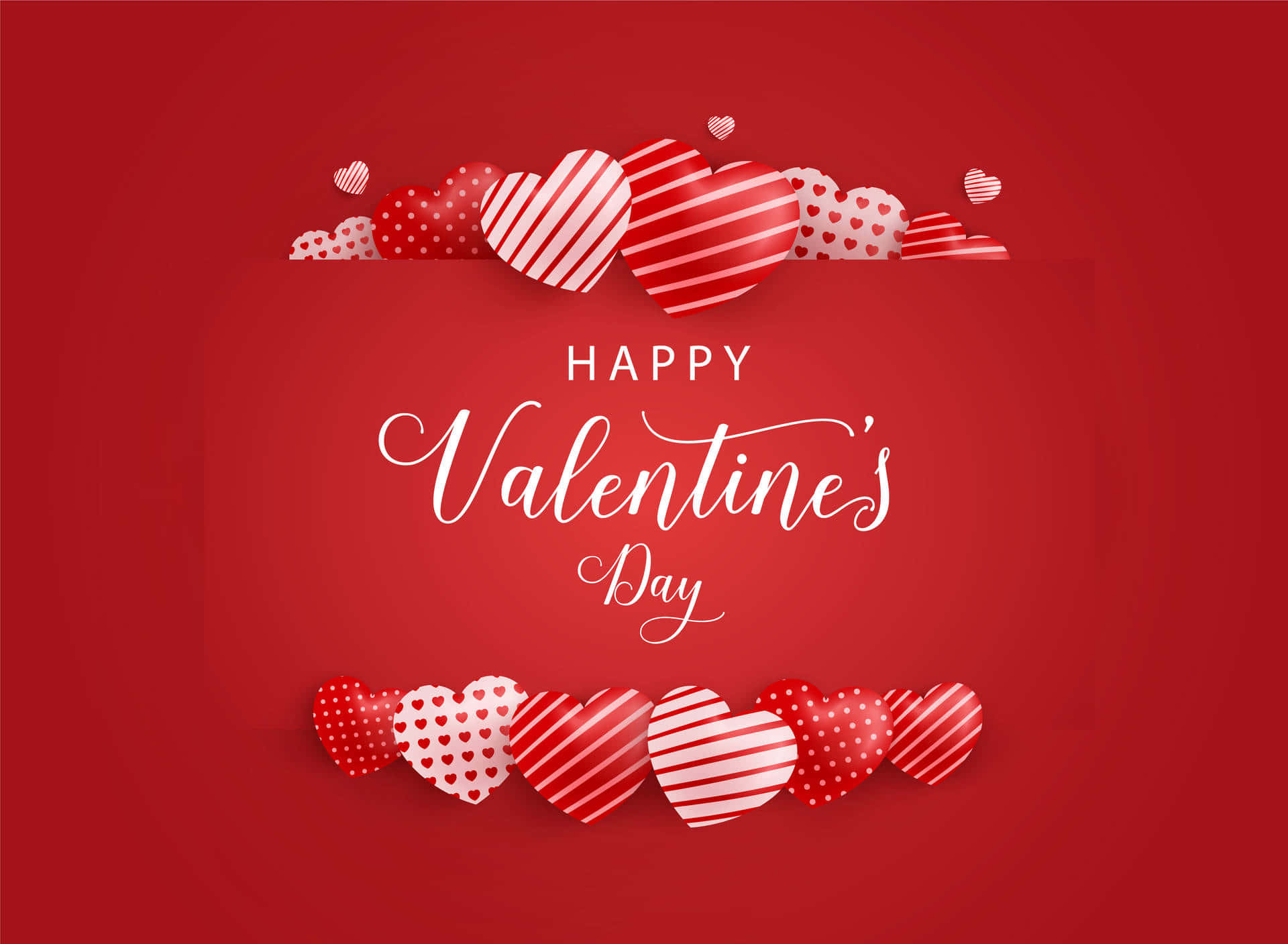 Happy Valentines Day 桌布 壁紙 — 一個喜慶的情人節祝福，白色手寫文字被層疊的紅色和白色圖案心形環繞，背景為純紅色。
