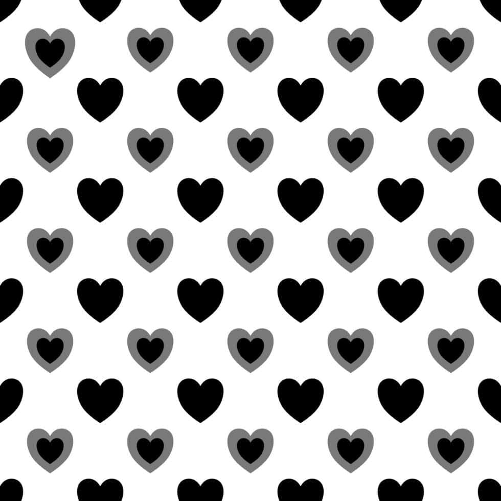 Black And White Heart 桌布 壁紙 — 一個在白色背景上以重複網格排列的黑灰心形無縫圖案。