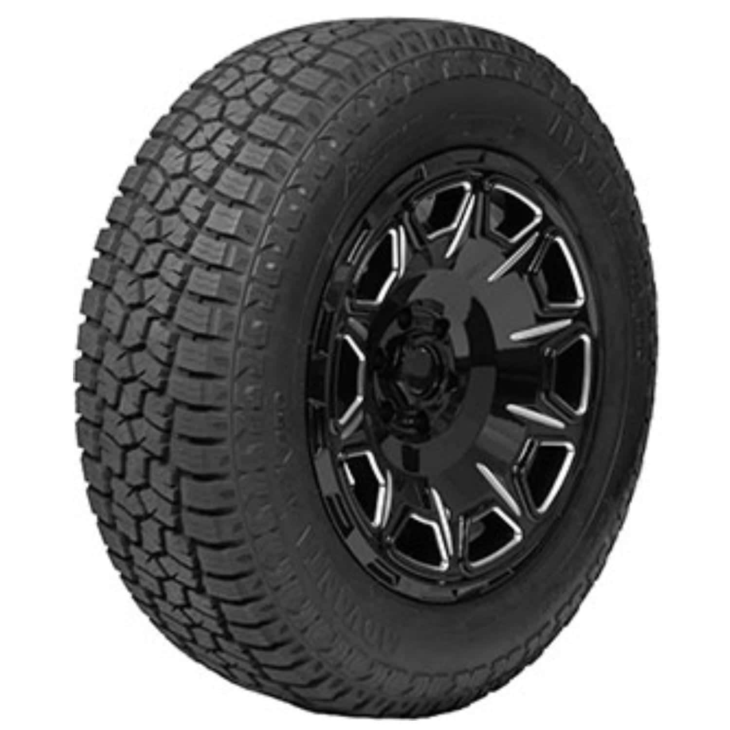 Winter Tires 桌布 壁紙 — 一個堅固的黑色越野輪胎，帶有深花紋，安裝在亮黑色多輻輪圈上，背景為白色。