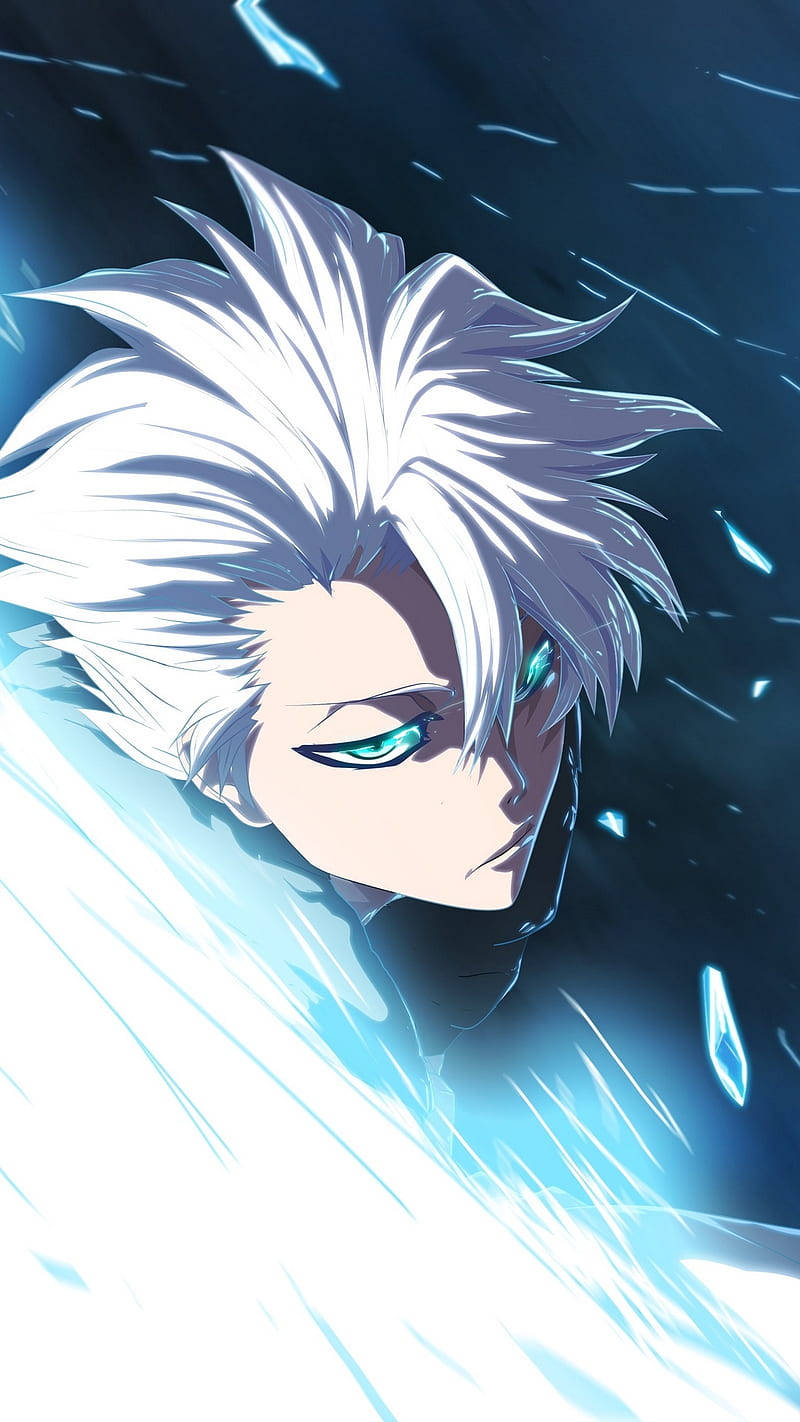 Bleach iPhone 桌布 壁紙 — 一個堅定的動漫戰士，擁有尖刺的白髮和發光的藍眼睛，在黑暗風暴的背景中引導冰冷能量。