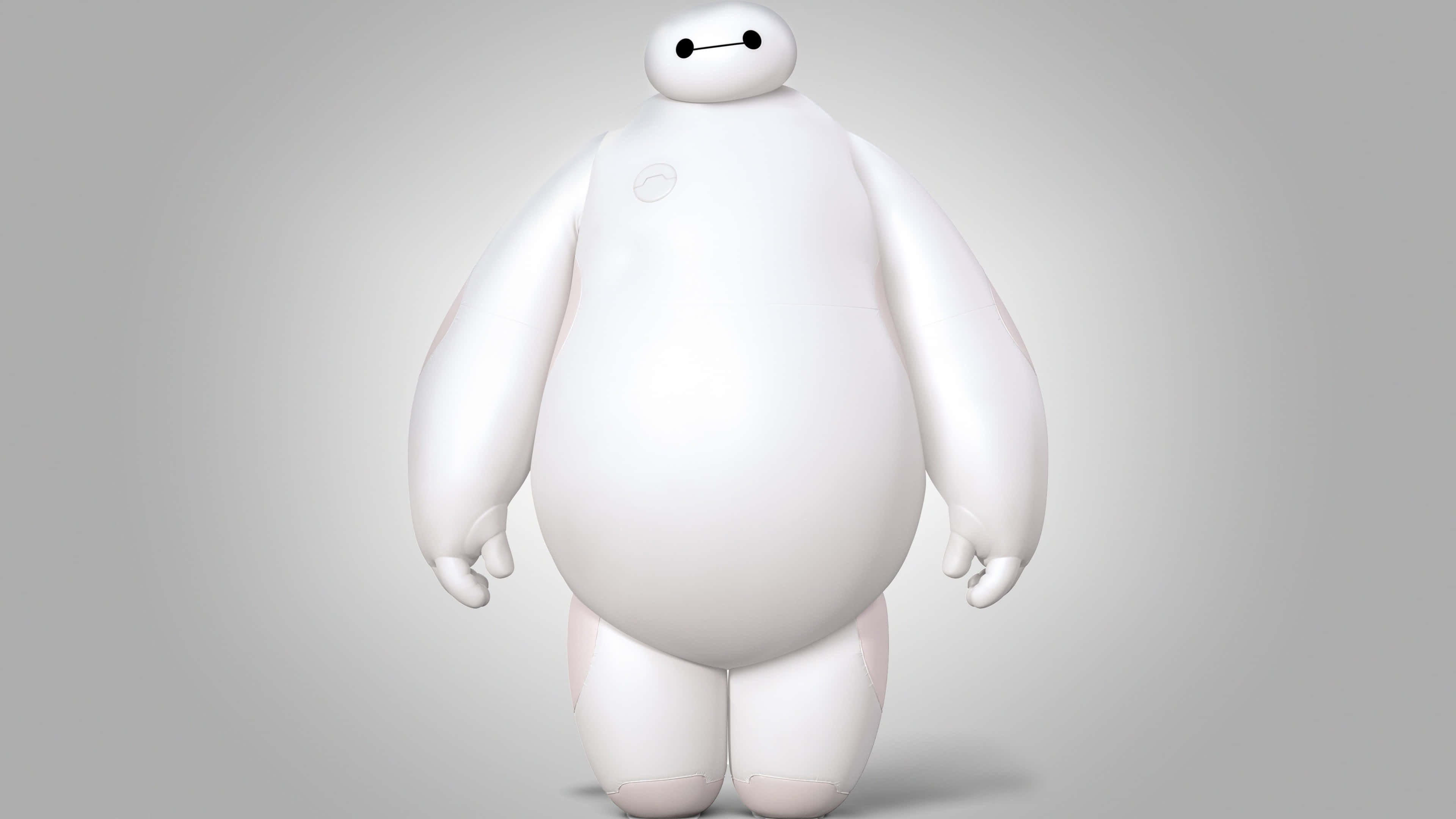 Animation Movies 桌布 壁紙 — 一個大型白色充氣機械人，帶有簡單的黑色眼睛，平靜地站在純灰色背景前。