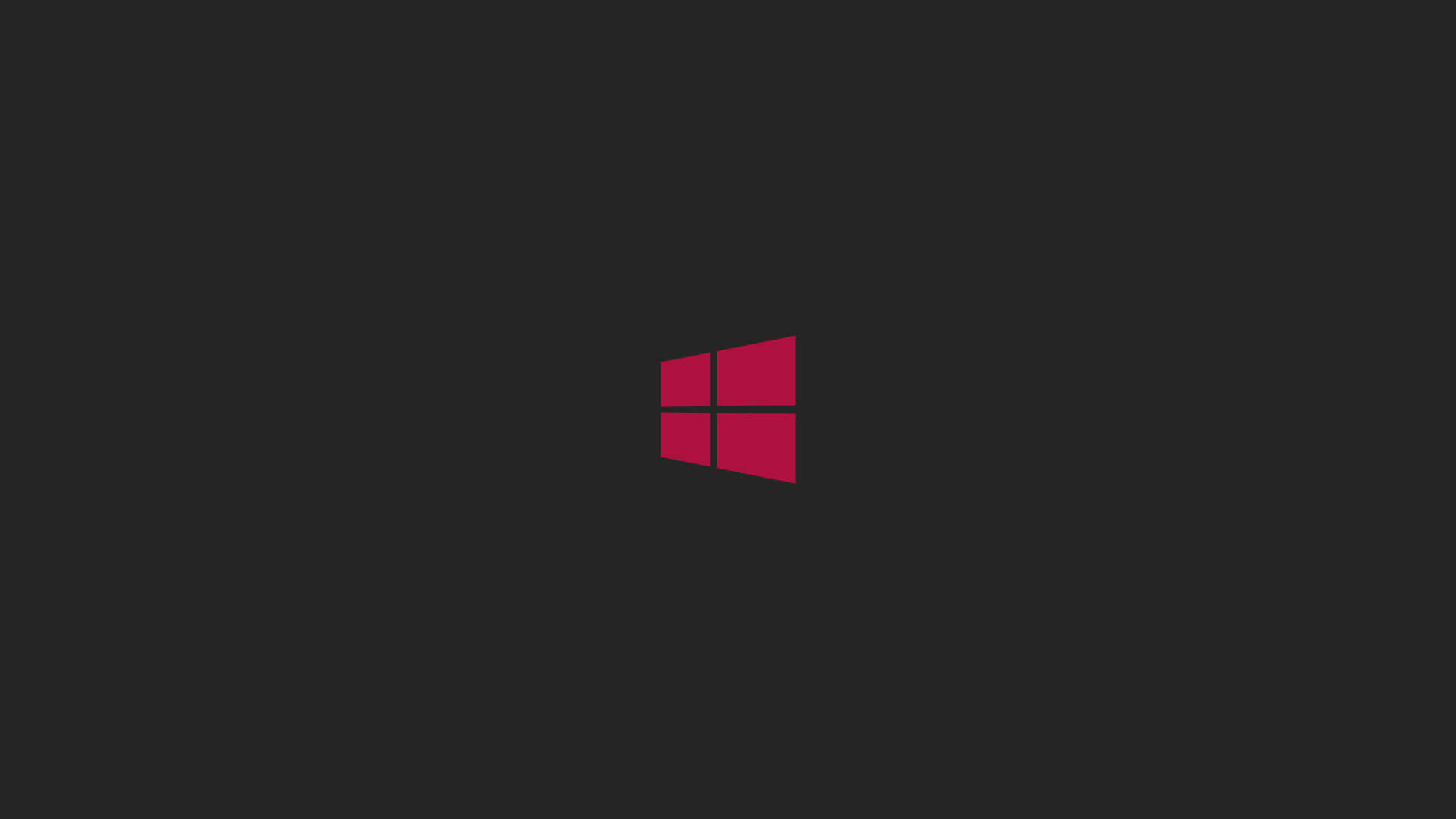 Windows 8 桌布 壁紙 — 一個大膽的紅色Windows標誌居中在純深灰色背景上。