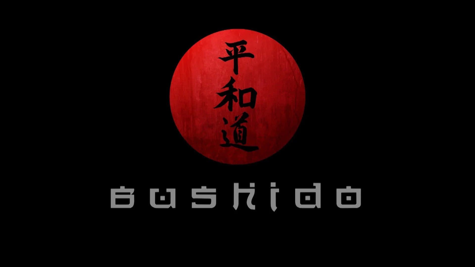 Bushido Samurai 桌布 壁紙 — 一個大膽的紅色圓圈，帶有黑色日文字元，下方有 bushido 字樣，背景為黑色。