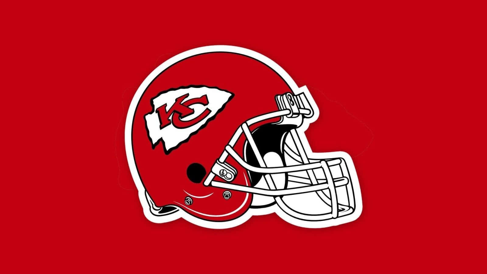 Kansas City Chiefs 桌布 壁紙 — 一個大膽的紅色堪薩斯城酋長隊美式足球頭盔，帶有白色飾邊和標誌，在純紅色背景上脫穎而出。