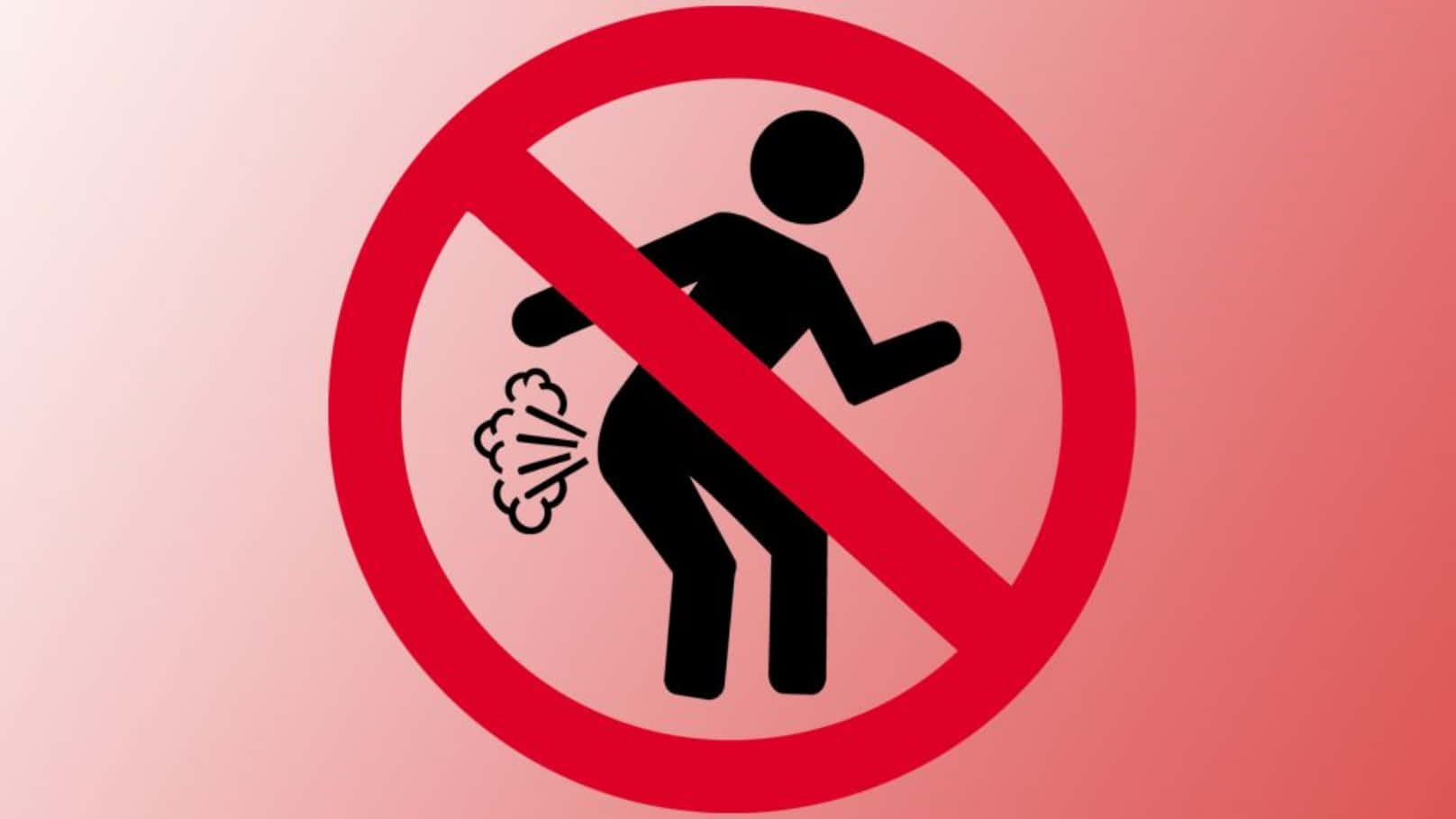 放屁 桌布 壁紙 — 一個大膽的紅色禁止標誌，在漸變粉紅色背景上以黑色火柴人圖示禁止公共排便。