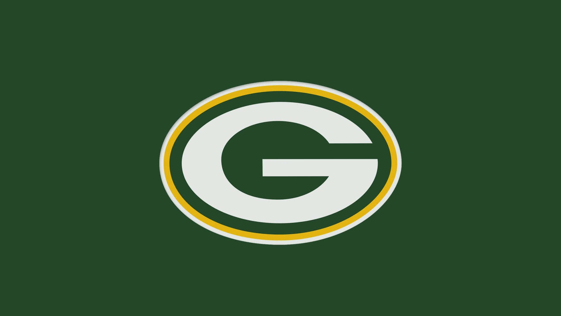Packers 桌布 壁紙 — 一個大膽的綠色和金色 'G' 標誌，居中放置在純深綠色背景上。
