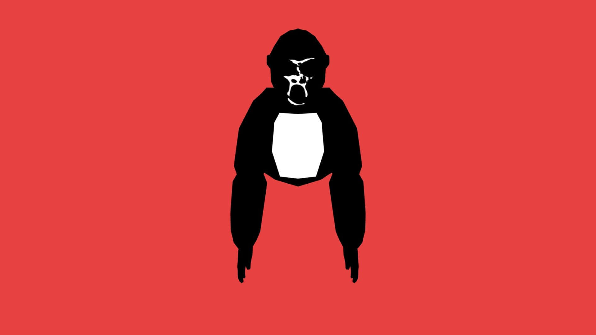 Gorilla Tag 桌布 壁紙 — 一個大膽的黑色大猩猩剪影，白色胸部和臉部，在鮮紅色背景上居中站立。