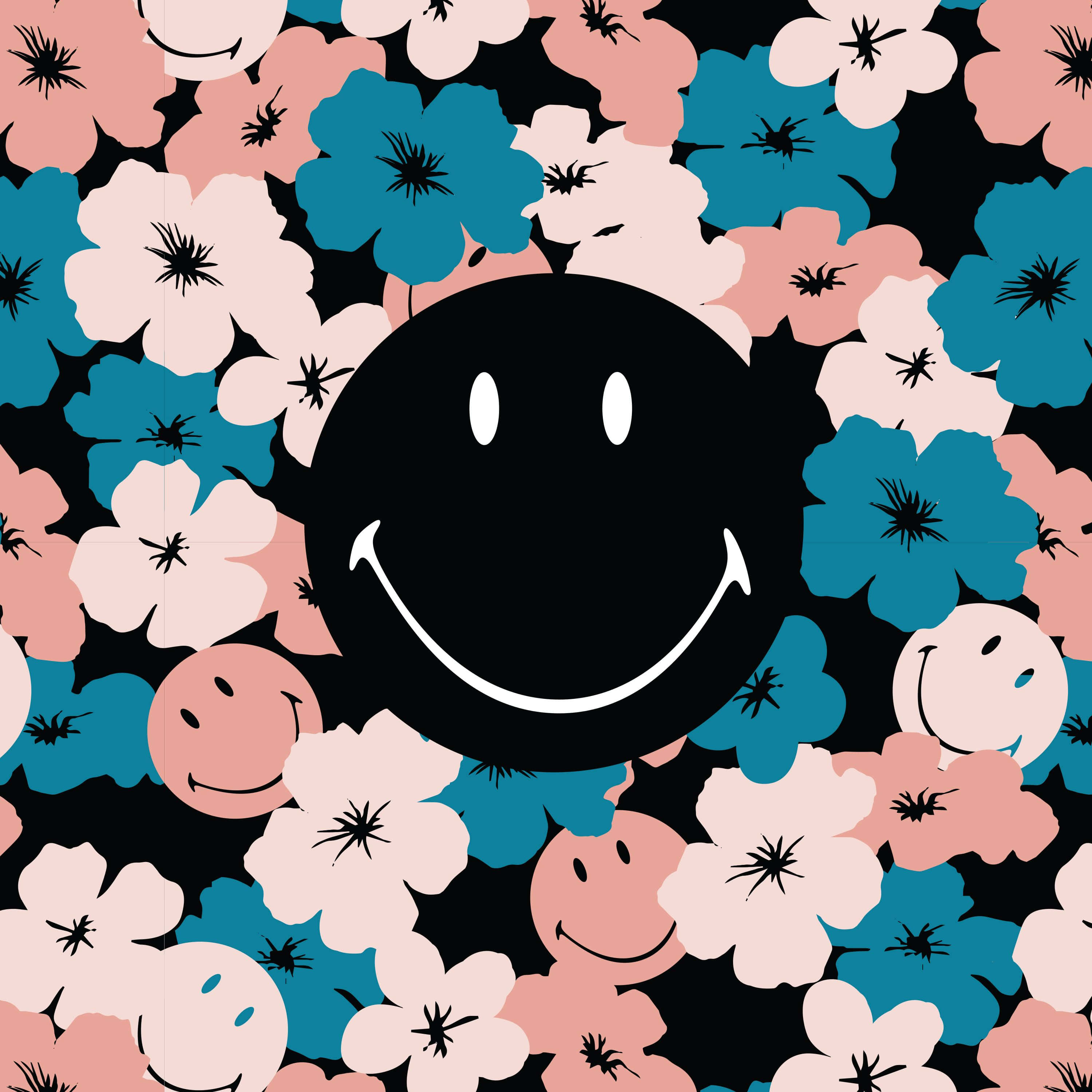 Smiley 桌布 壁紙 — 一個大膽的黑色笑臉在深色背景上，在粉紅色和藍綠色花朵（帶黑色花心）的鮮豔圖案中微笑。