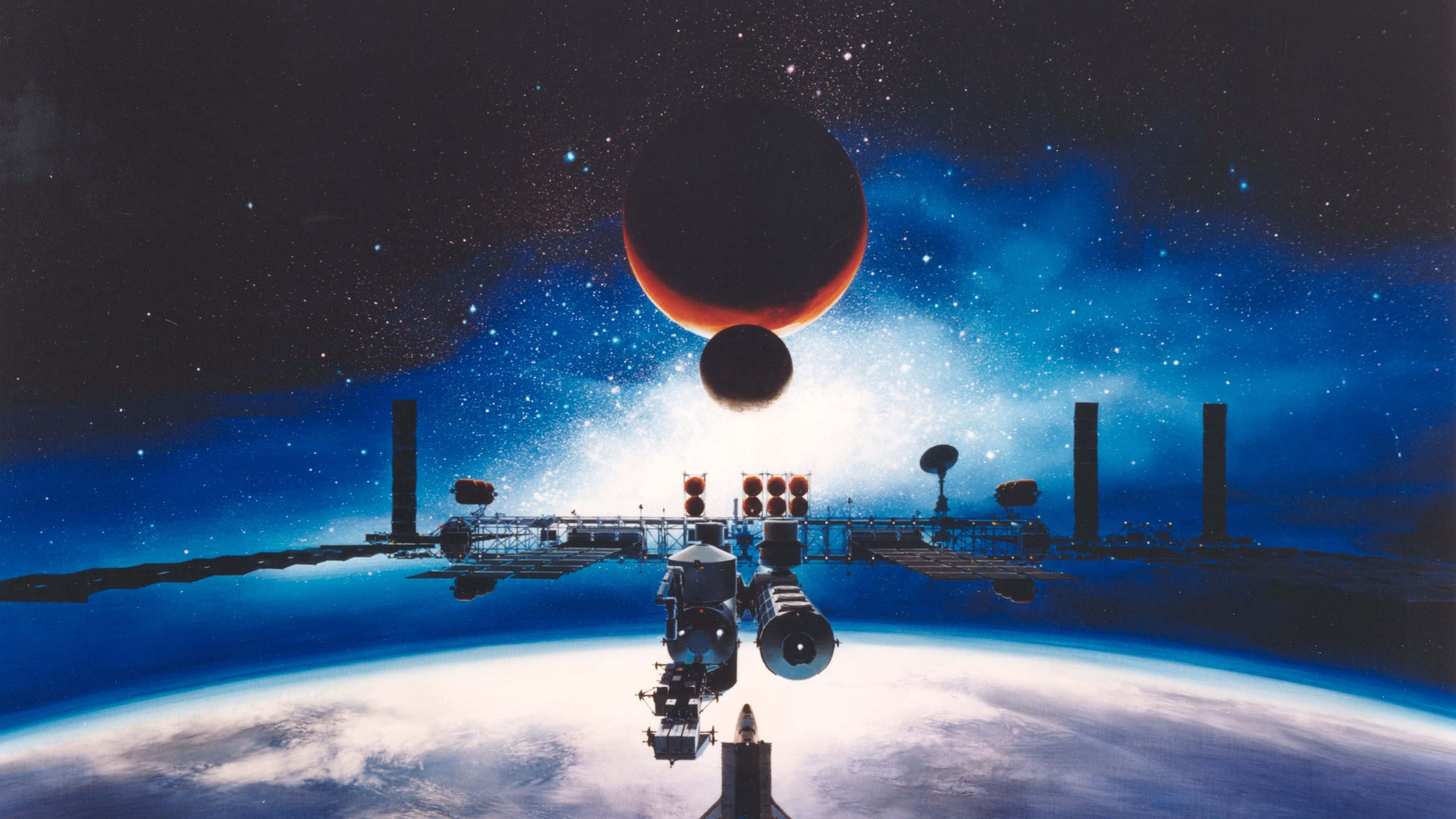 Space Technology 桌布 壁紙 — 一個太空站繞地球運行，上方星空中有紅色行星和月球。