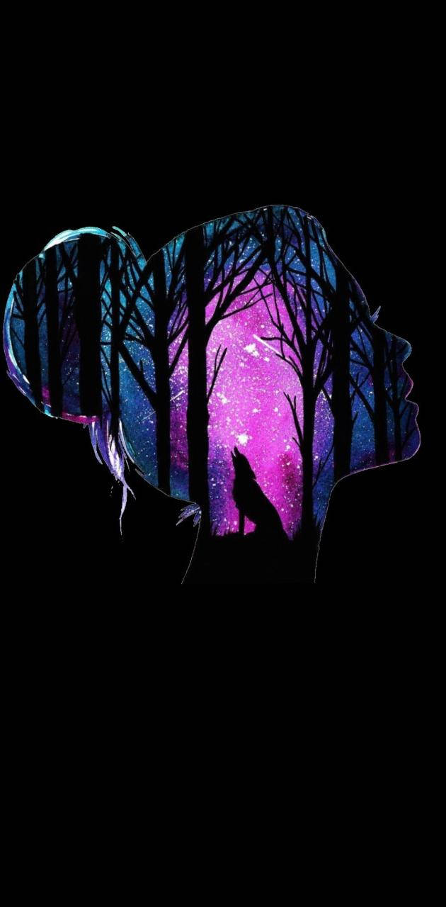 Silhouette 桌布 壁紙 — 一個女性頭部的剪影，內部充滿發光的紫色星系和光禿禿的樹木，還有一隻狼在裏面嚎叫。