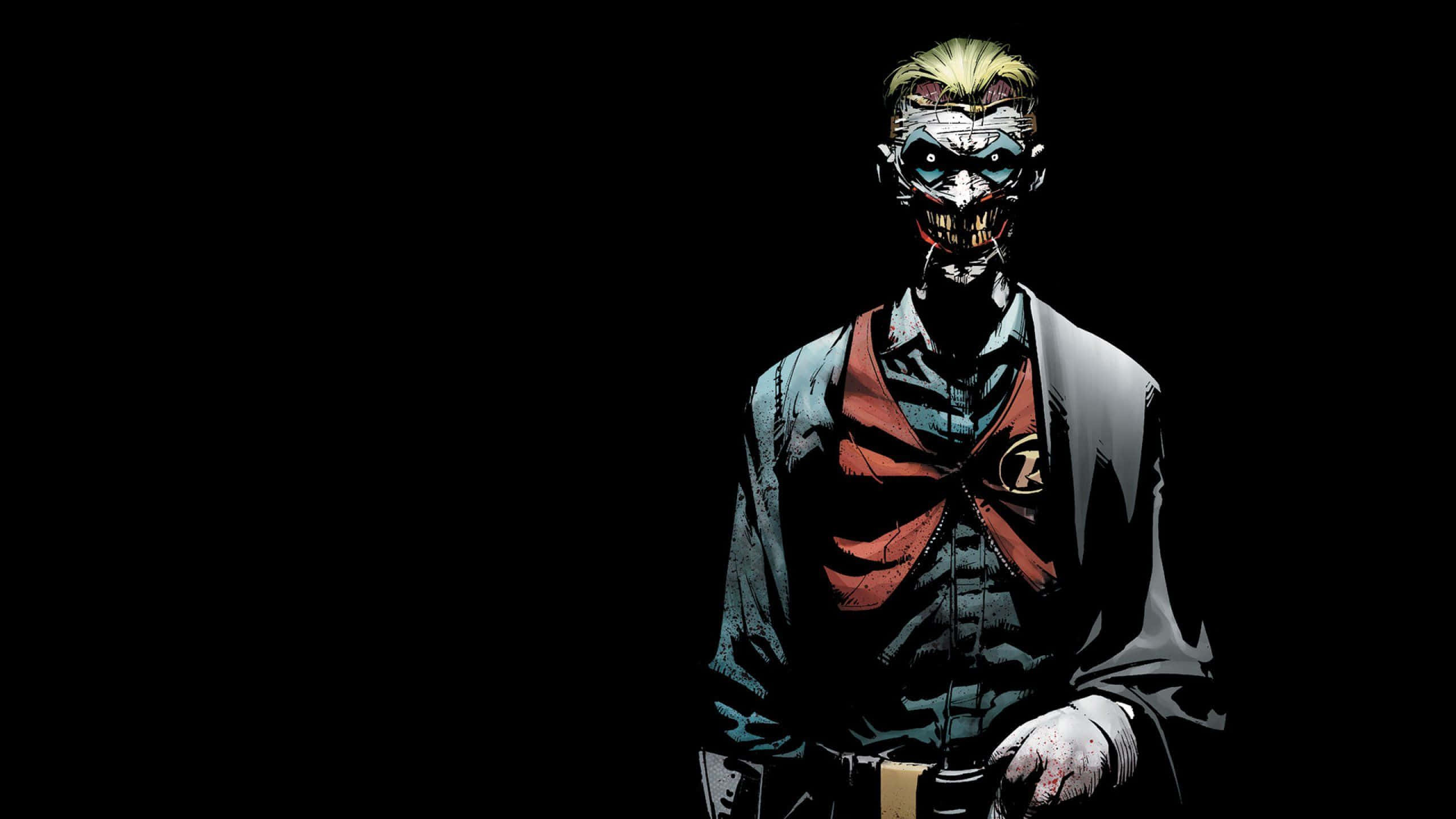 Joker Comic 桌布 壁紙 — 一個威脅性的漫畫反派，有著怪誕的彩繪臉孔和鋒利的牙齒，站在黑色背景前。
