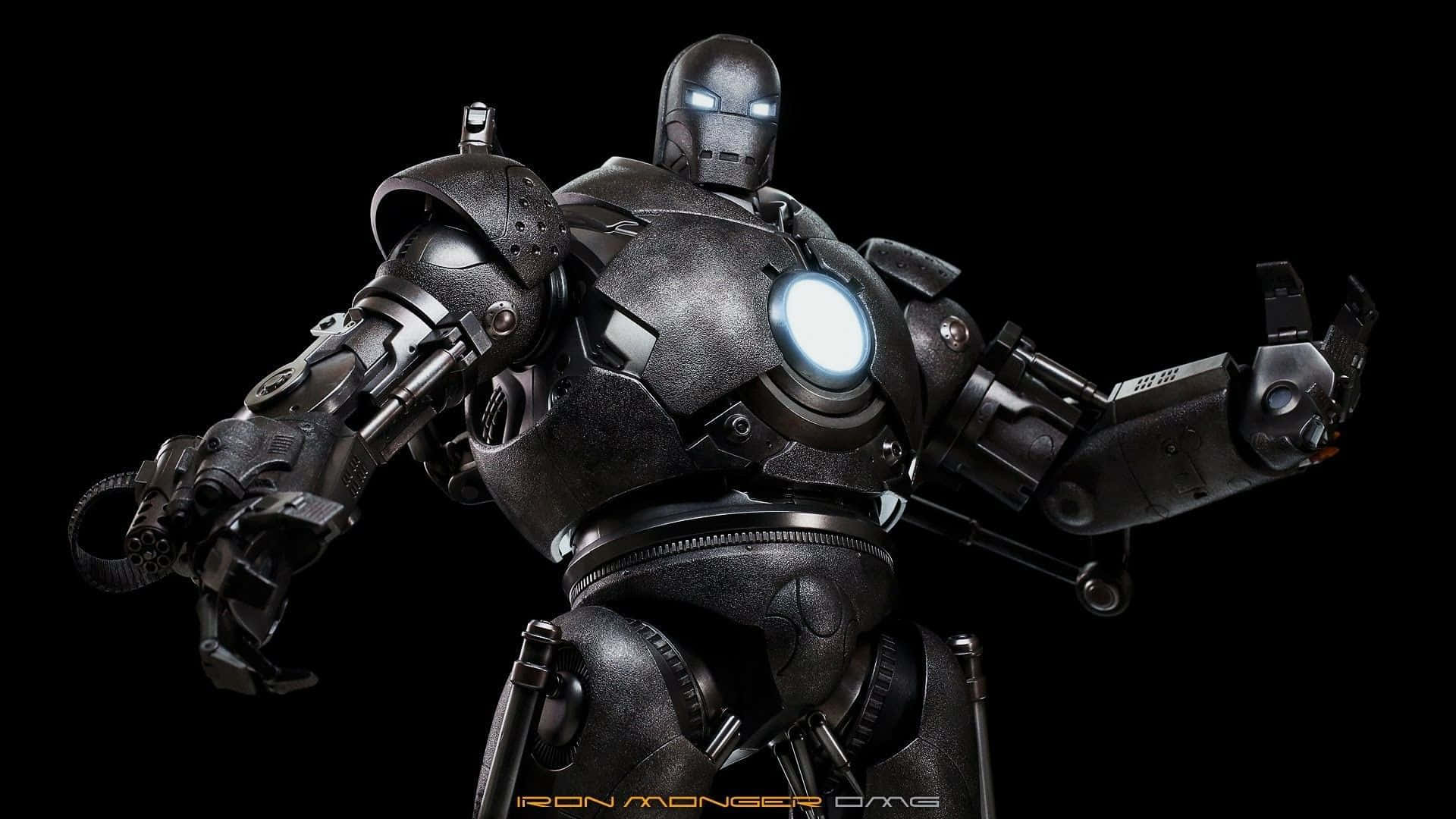 Iron Monger 桌布 壁紙 — 一個威脅性的黑色裝甲鐵霸王站在黑暗背景前，散發著藍色光芒的眼睛和胸部弧形反應爐。
